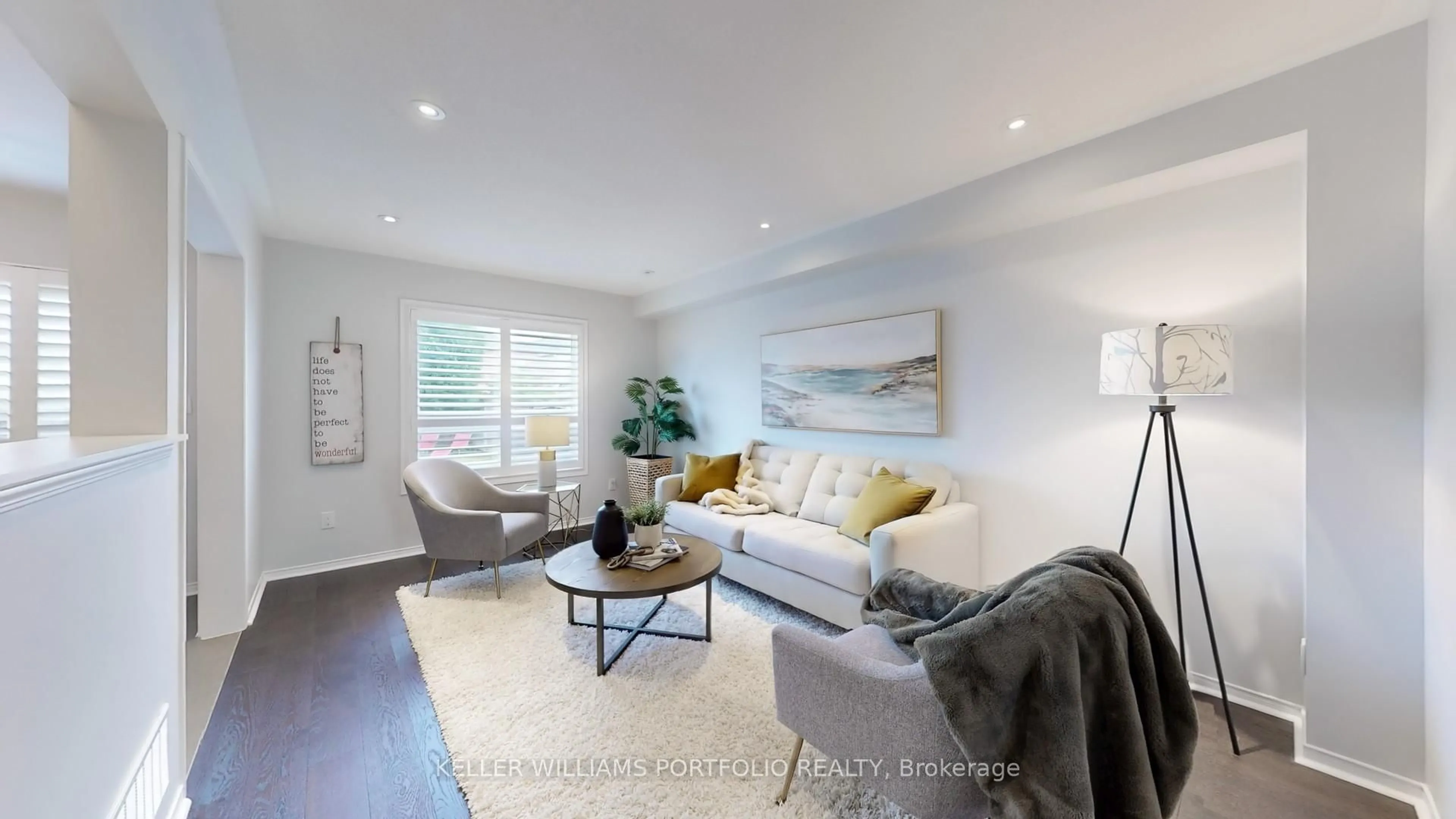 Living room with furniture, wood/laminate floor for 773 Miller Park Ave, Bradford West Gwillimbury Ontario L3Z 0L8