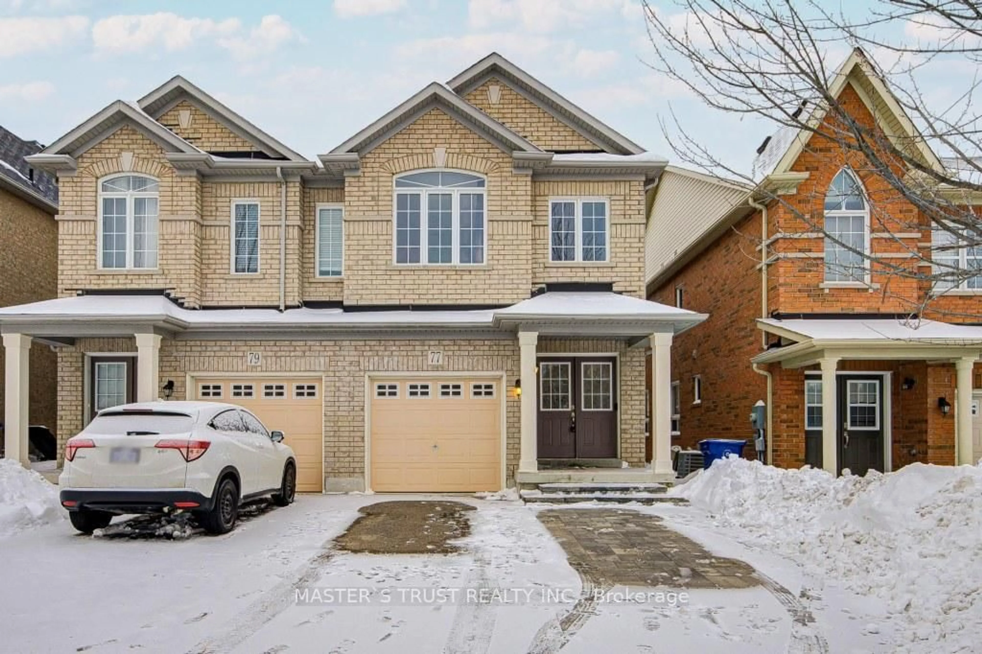 Home with brick exterior material, street for 77 Harvest Hills Blvd, East Gwillimbury Ontario L9N 0B4