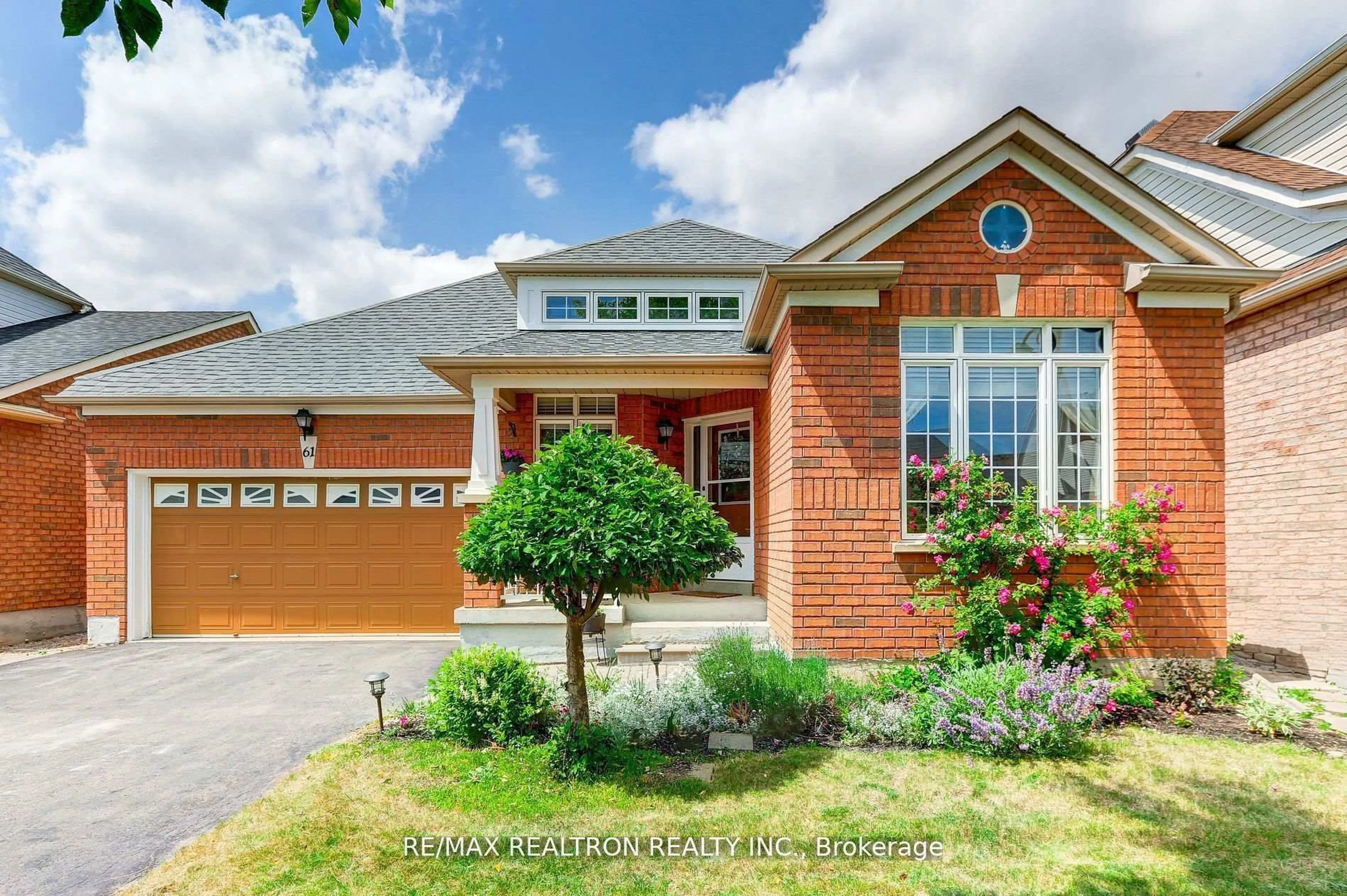 Home with brick exterior material, street for 61 Manorwood Dr, Markham Ontario L6C 2S2