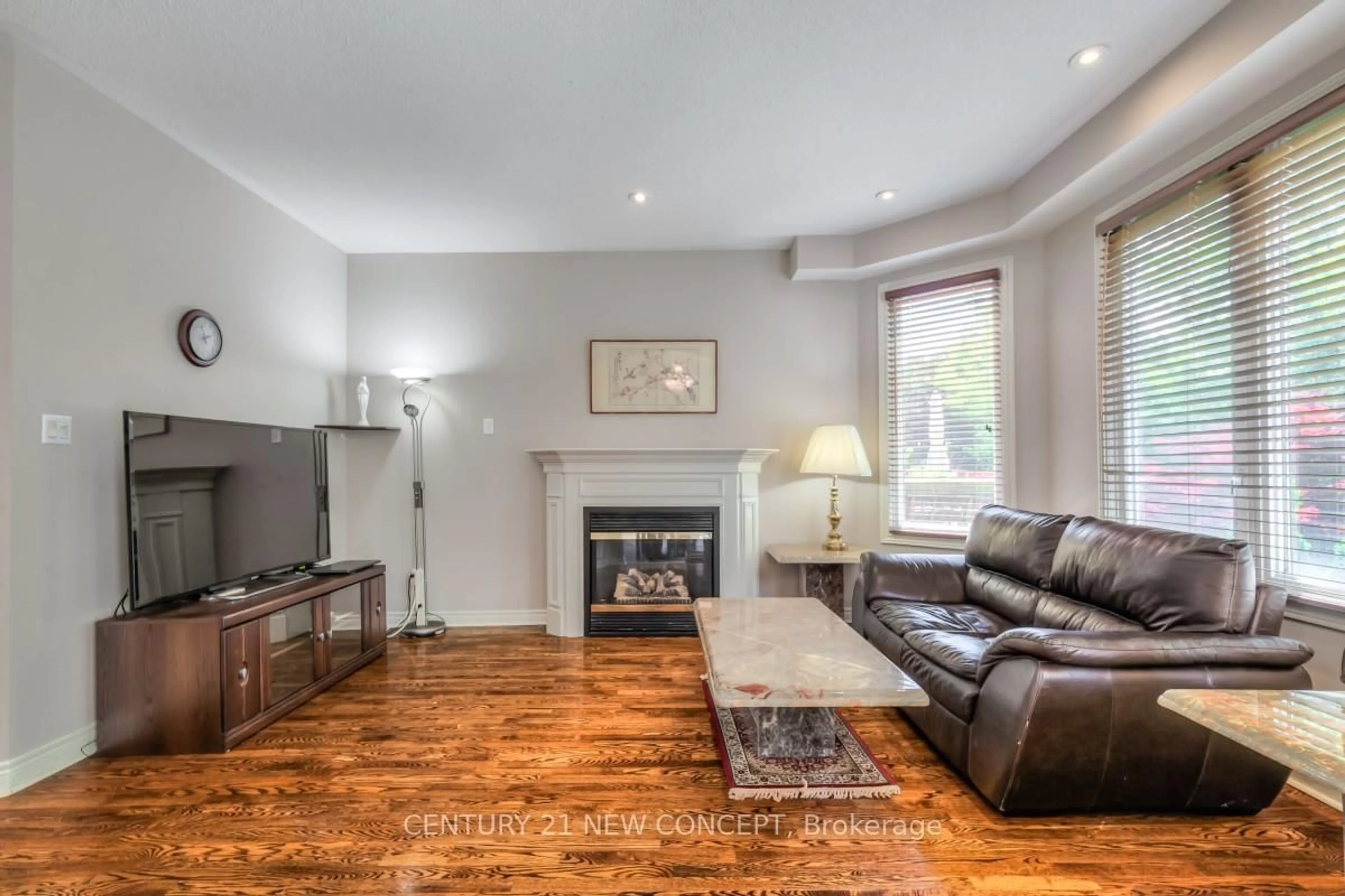 Living room with furniture, wood/laminate floor for 115 Ridgeway Crt, Vaughan Ontario L6A 2R5