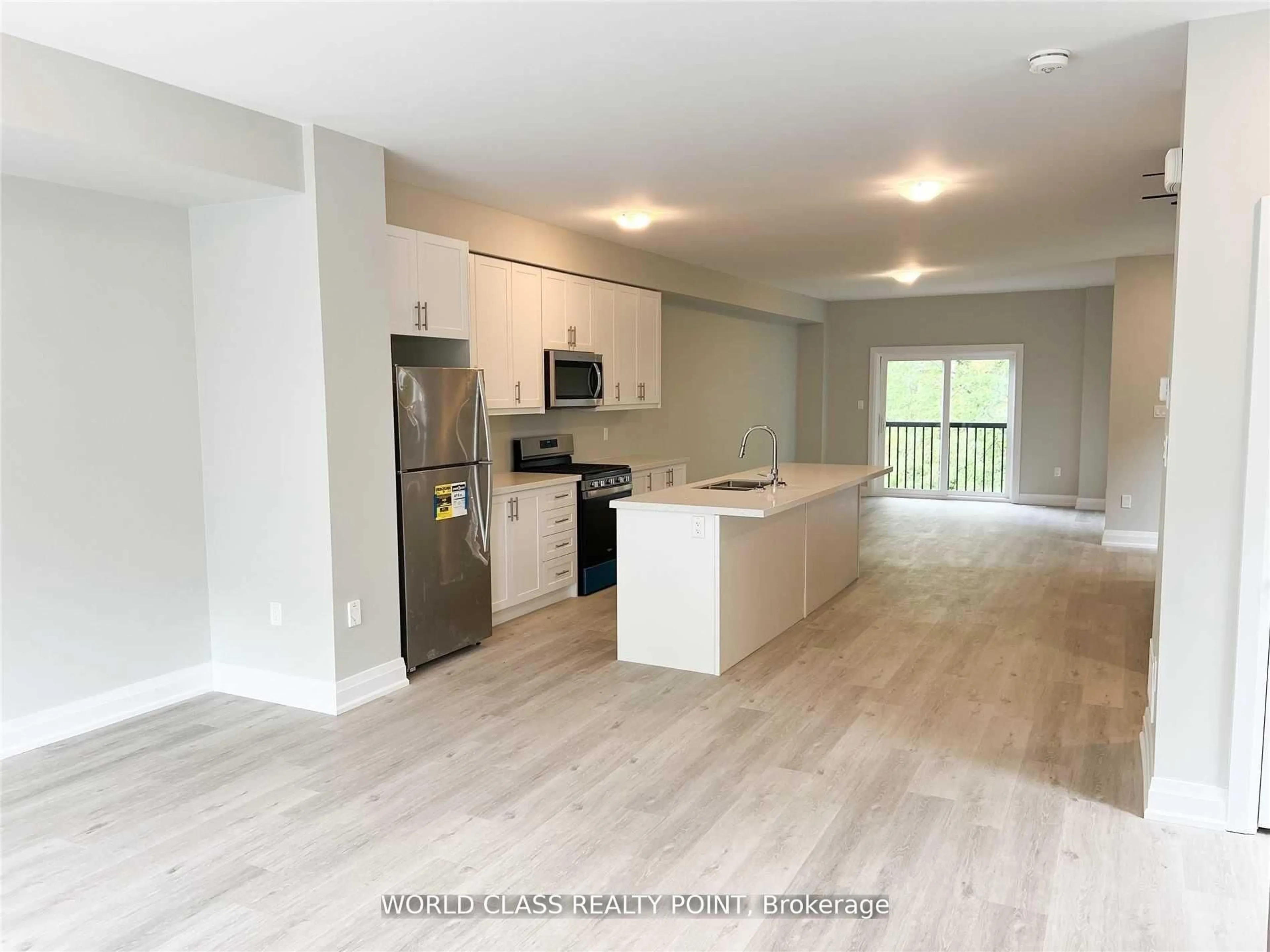 Open concept kitchen, wood/laminate floor for 1490 Purchase Pl, Innisfil Ontario L0L 1W0