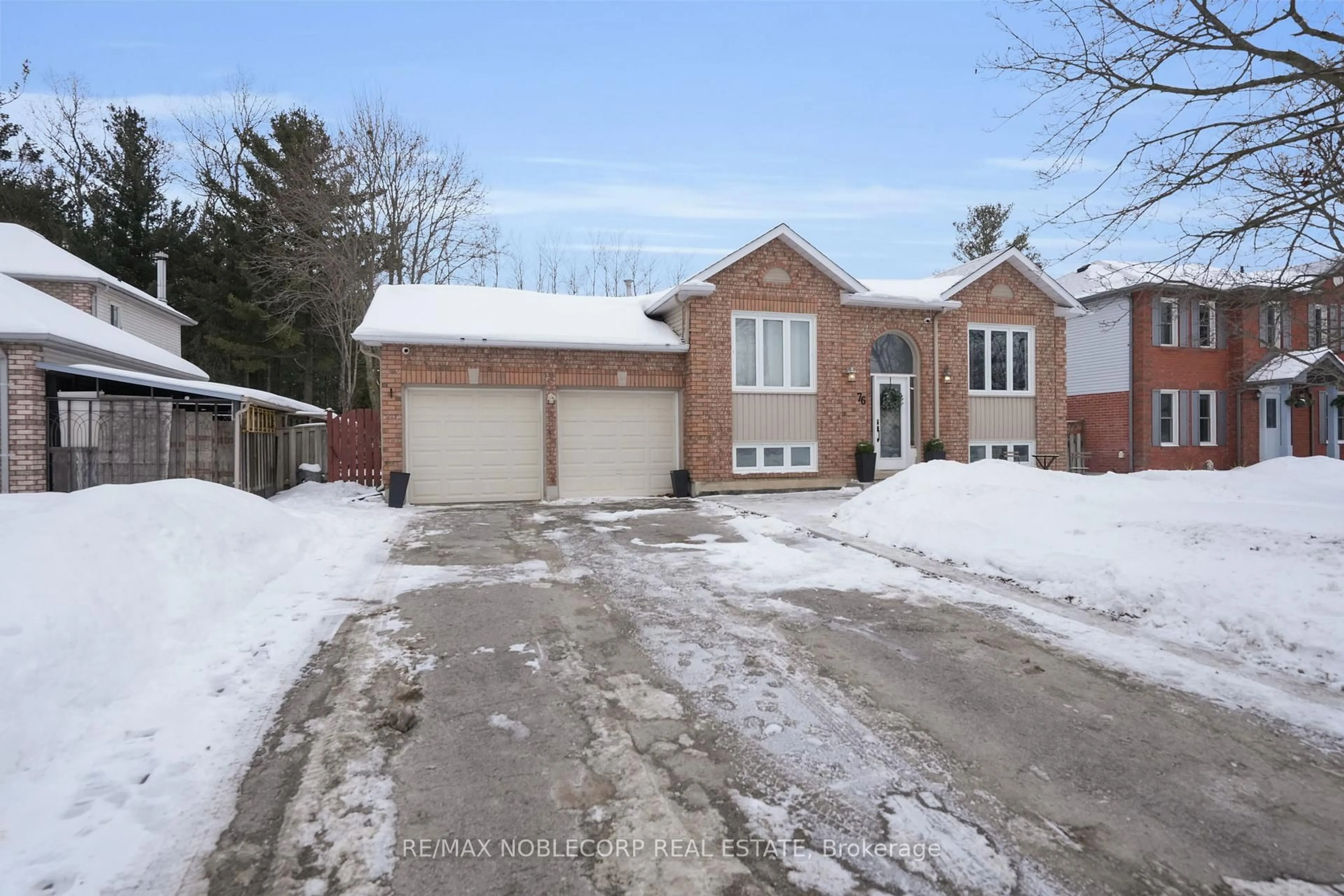 Home with brick exterior material, street for 76 Edenbridge Dr, Essa Ontario L3W 0K8