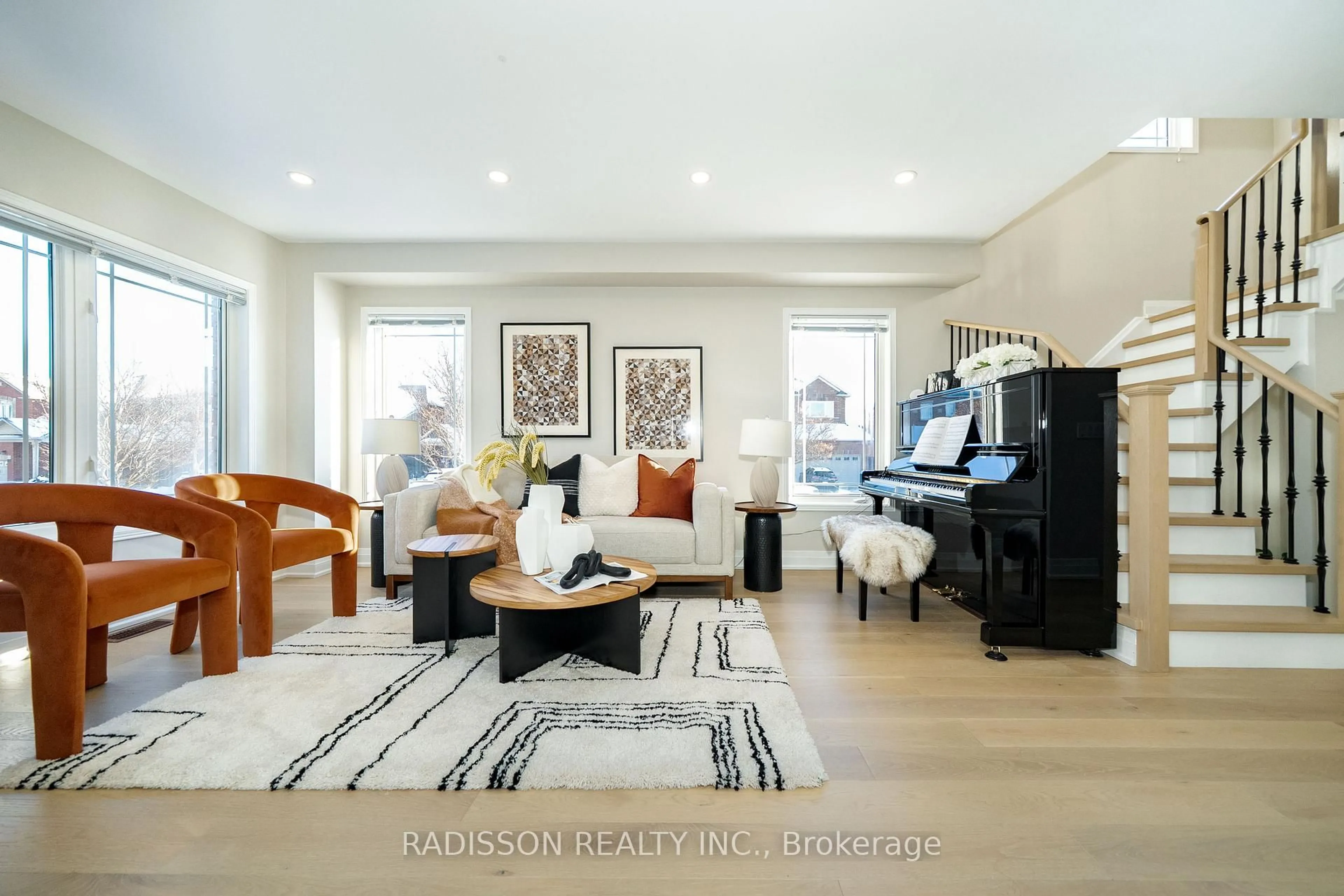 Living room with furniture, wood/laminate floor for 94 Bilbrough St, Aurora Ontario L4G 7W4