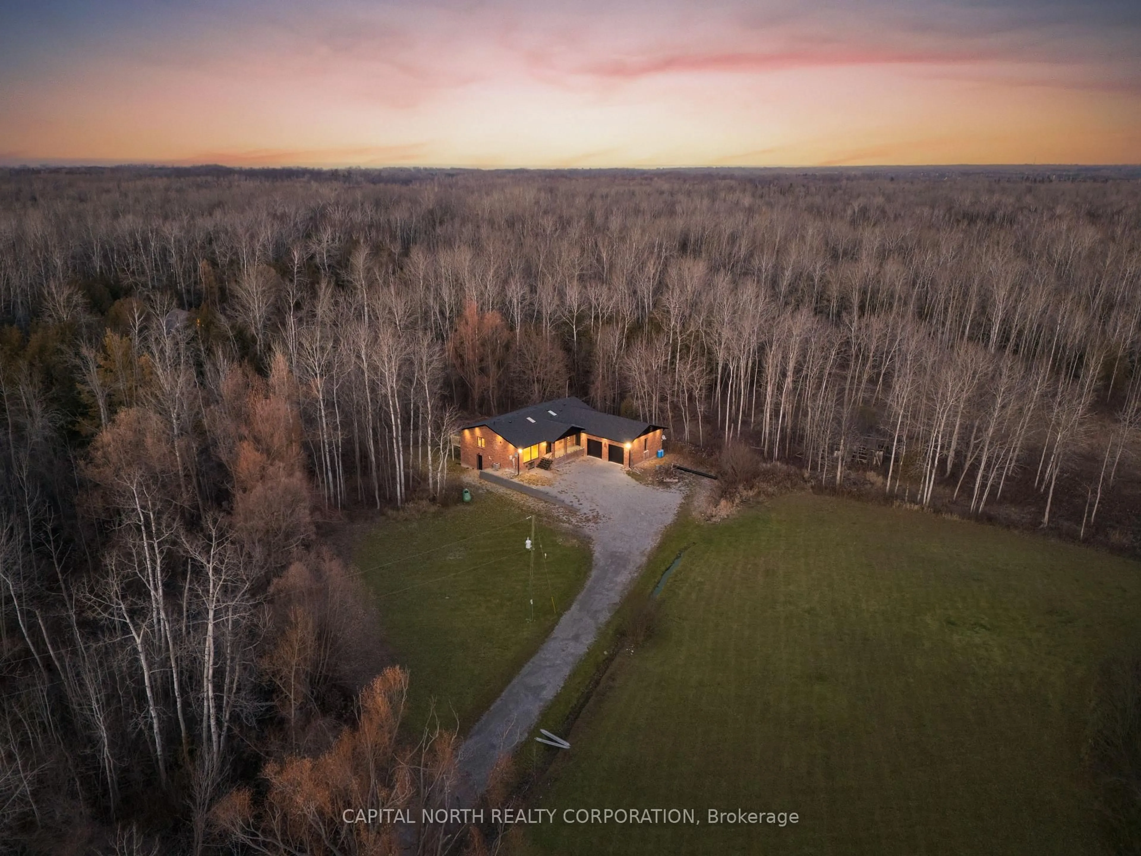 A pic from outside/outdoor area/front of a property/back of a property/a pic from drone, unknown for 26375 Woodbine Ave, Georgina Ontario L4P 3E9