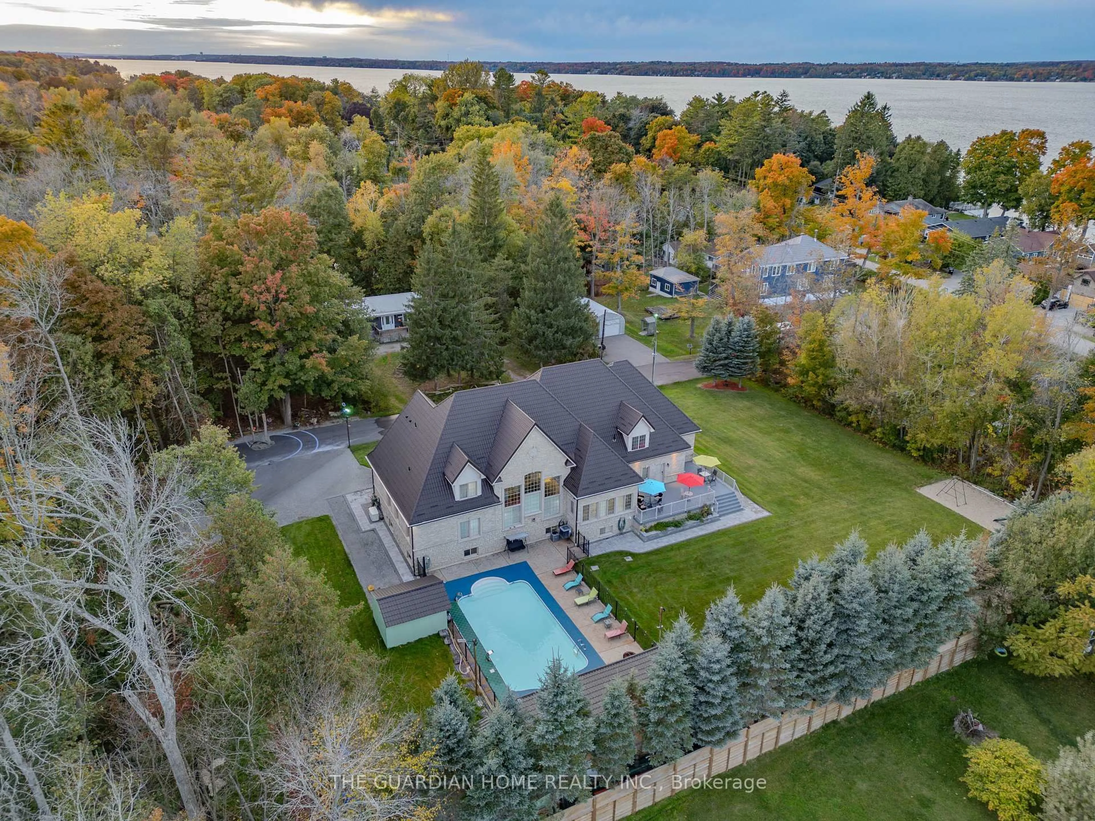 A pic from outside/outdoor area/front of a property/back of a property/a pic from drone, water/lake/river/ocean view for 3965 Algoma Ave, Innisfil Ontario L9S 2M1