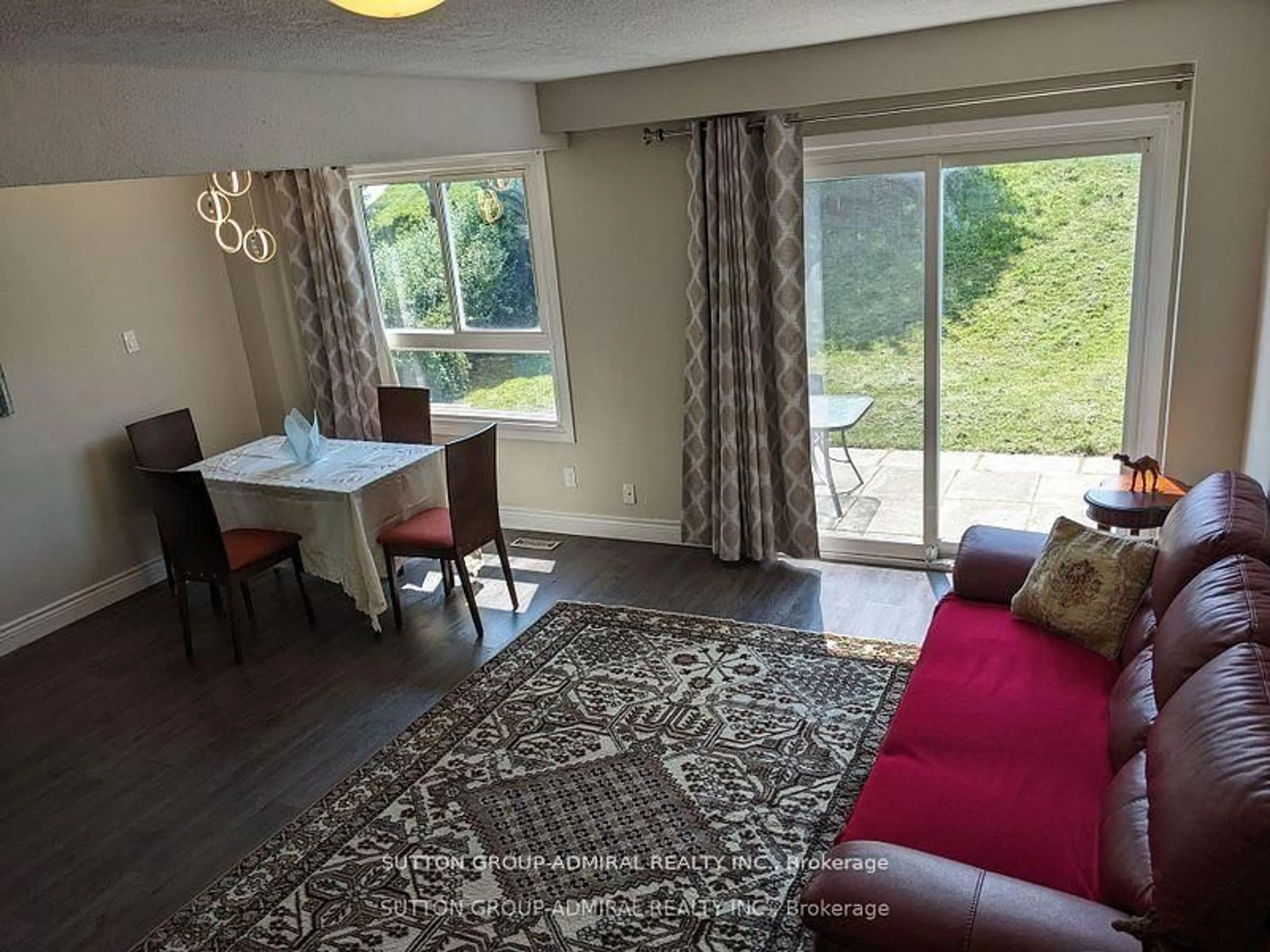 Living room with furniture, wood/laminate floor for 47 Riviera Dr, Vaughan Ontario L4K 2H9