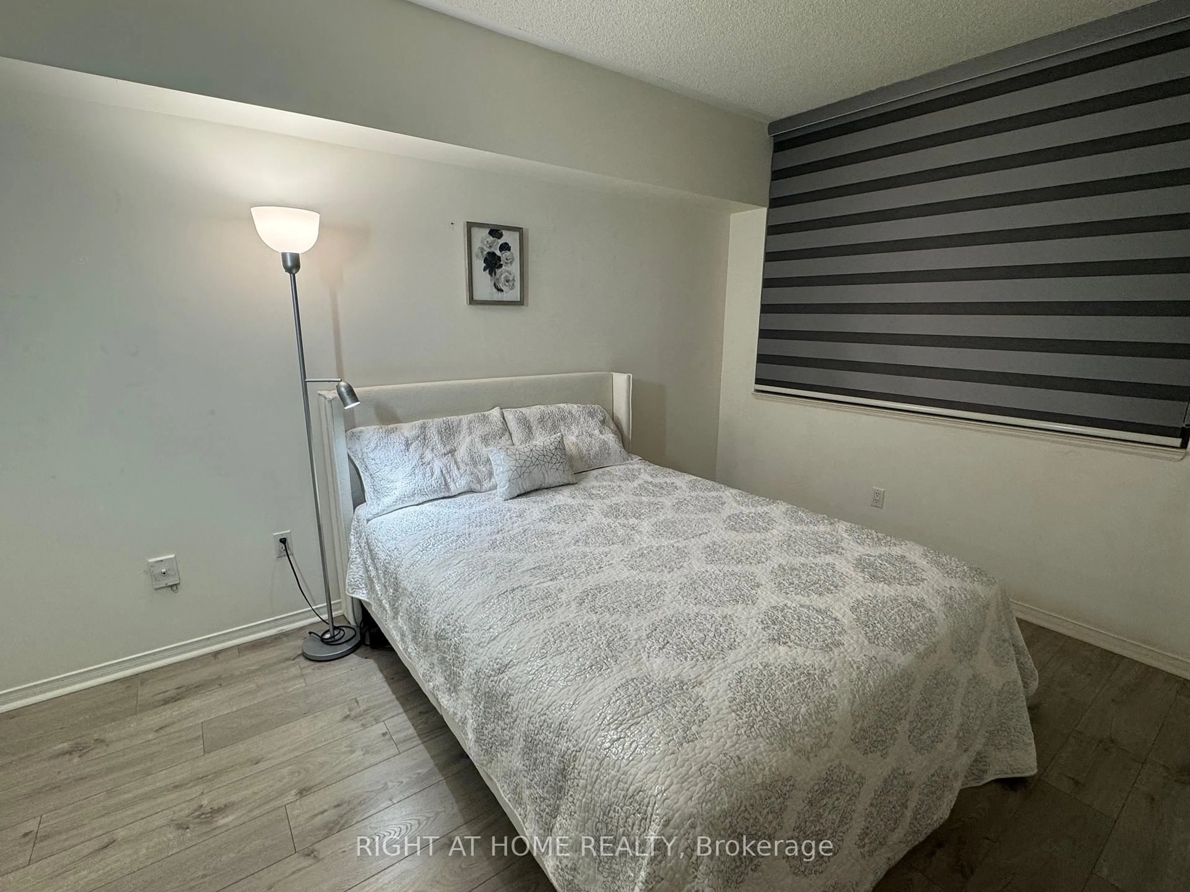 Bedroom with bed, unknown for 7378 Yonge St #212, Vaughan Ontario L4J 8J1