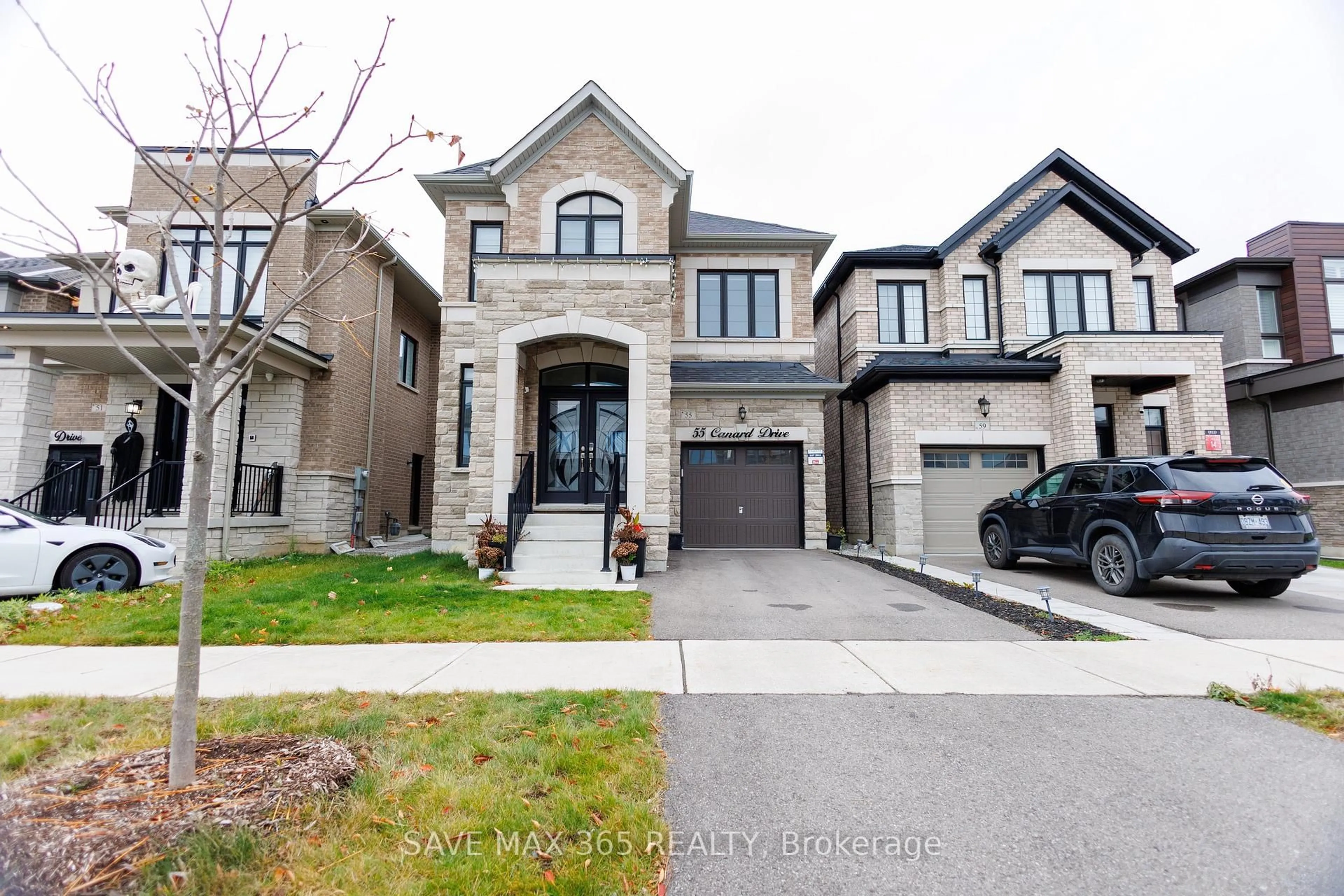 Home with brick exterior material, street for 55 Canard Dr, Vaughan Ontario L4H 5C4