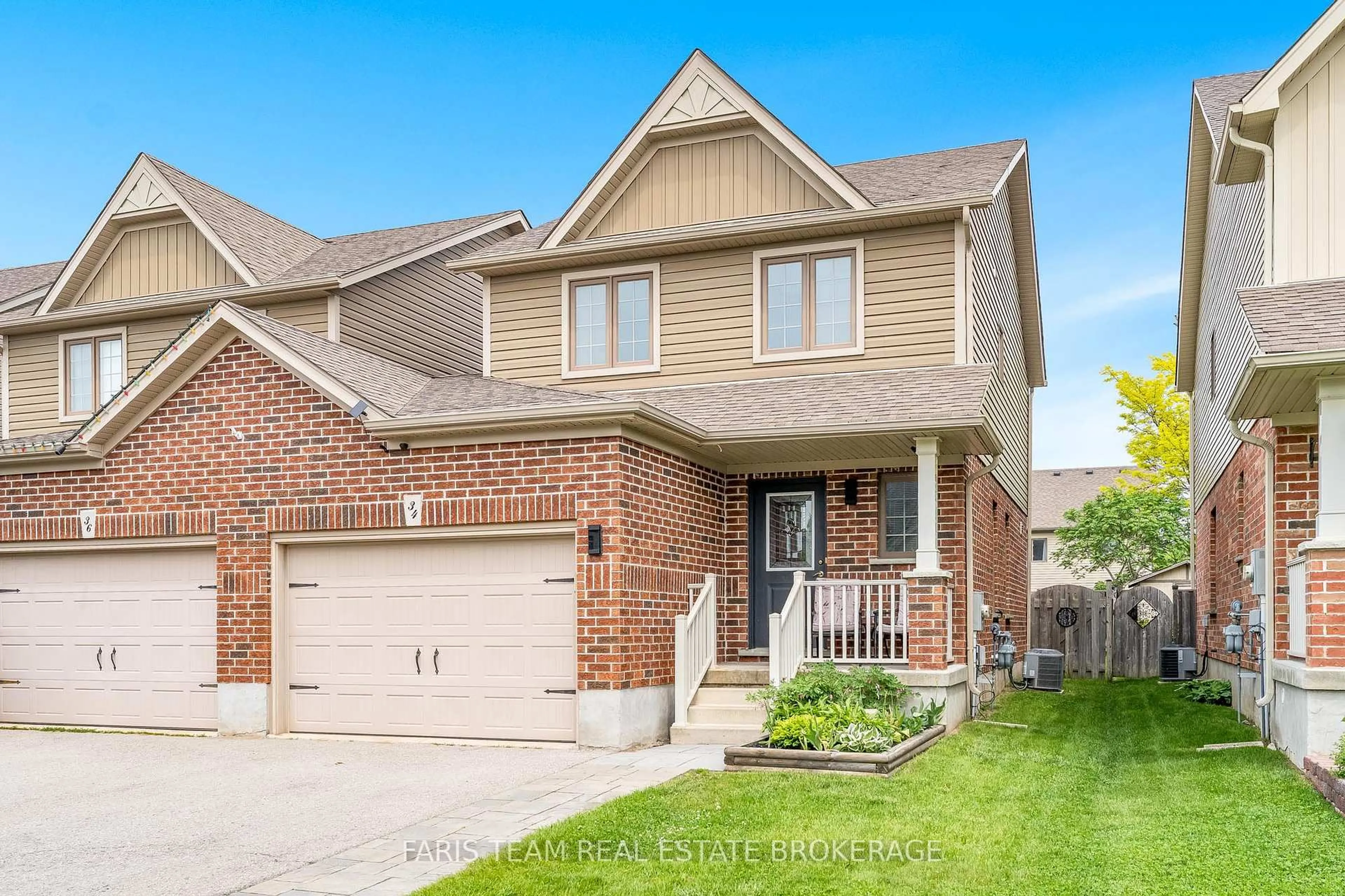 Home with brick exterior material, street for 34 Quigley St, Essa Ontario L0M 1B5