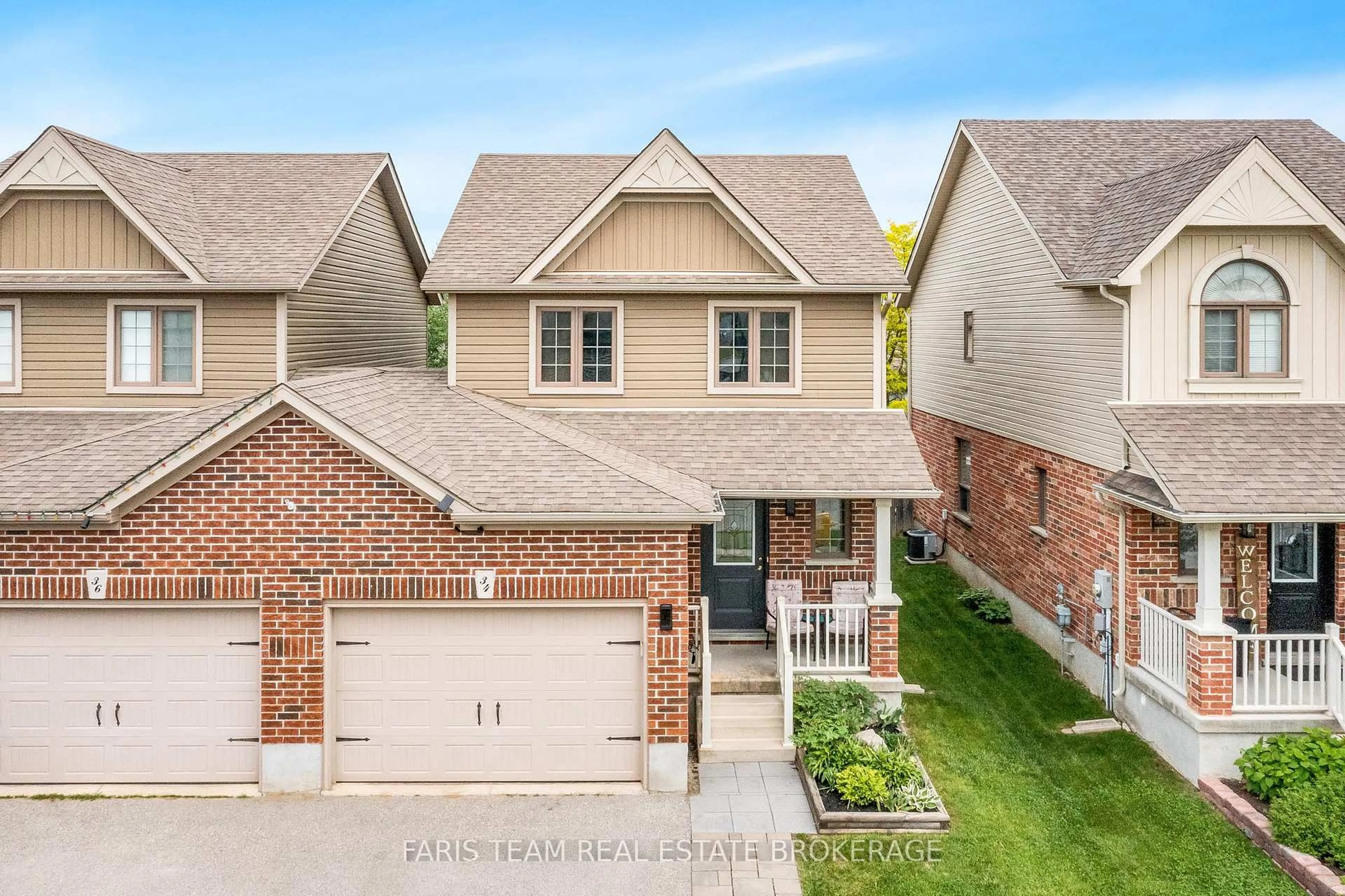 A pic from outside/outdoor area/front of a property/back of a property/a pic from drone, street for 34 Quigley St, Essa Ontario L0M 1B5