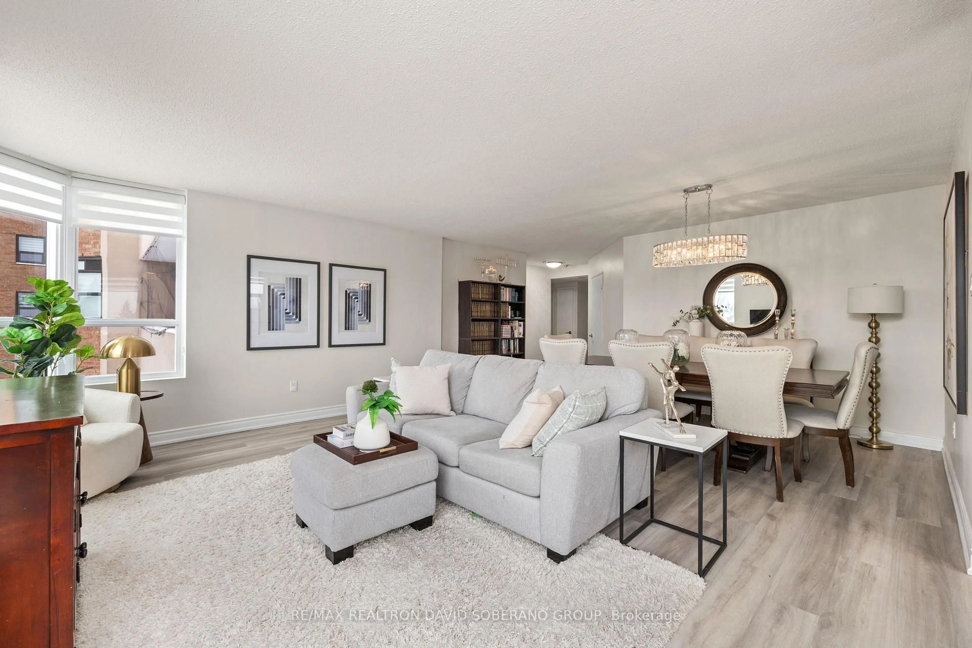 Living room with furniture, unknown for 7601 Bathurst St #315, Vaughan Ontario L4J 4H5