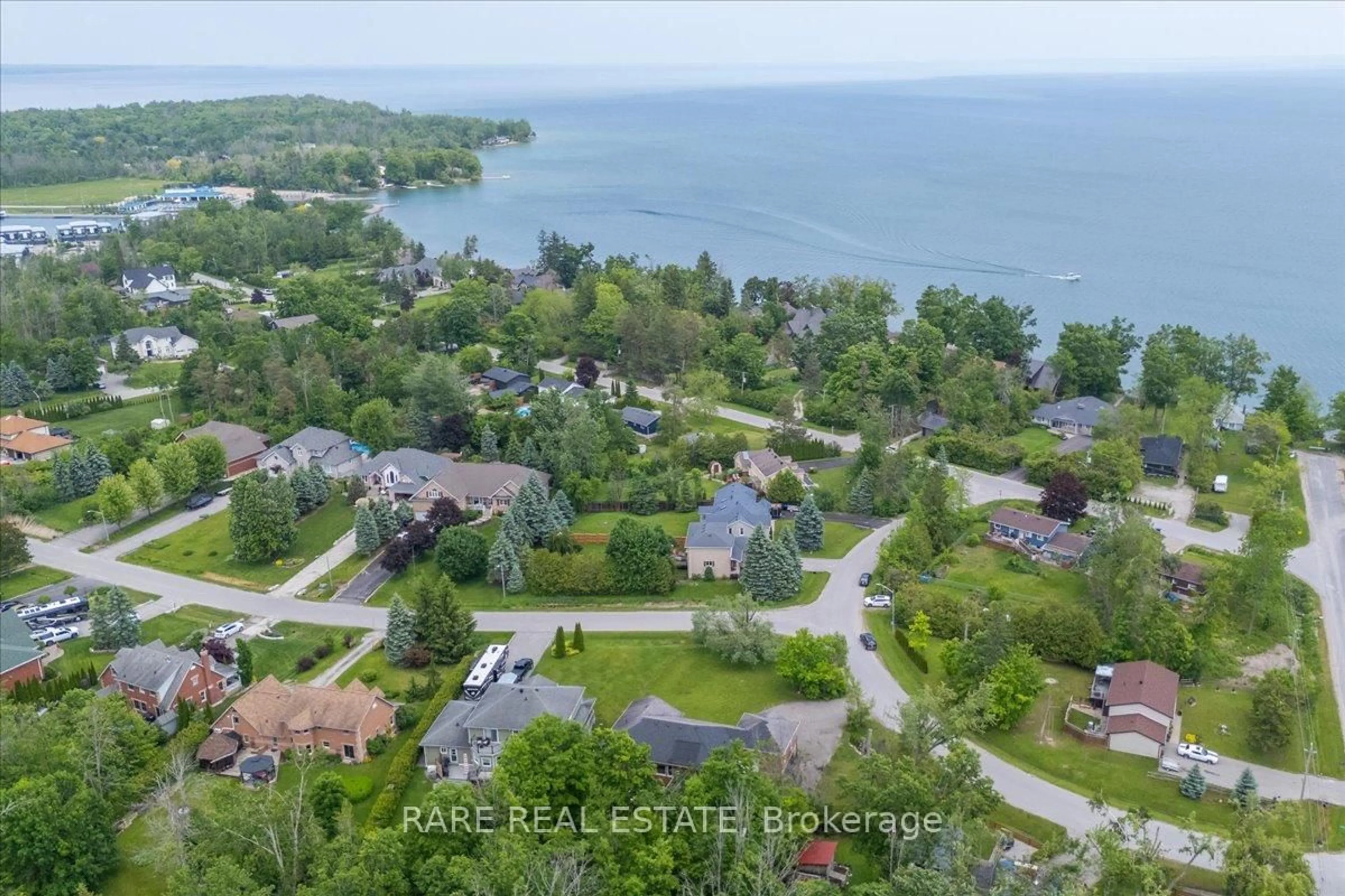 A pic from outside/outdoor area/front of a property/back of a property/a pic from drone, water/lake/river/ocean view for 3618 Linda St, Innisfil Ontario L9S 2L2