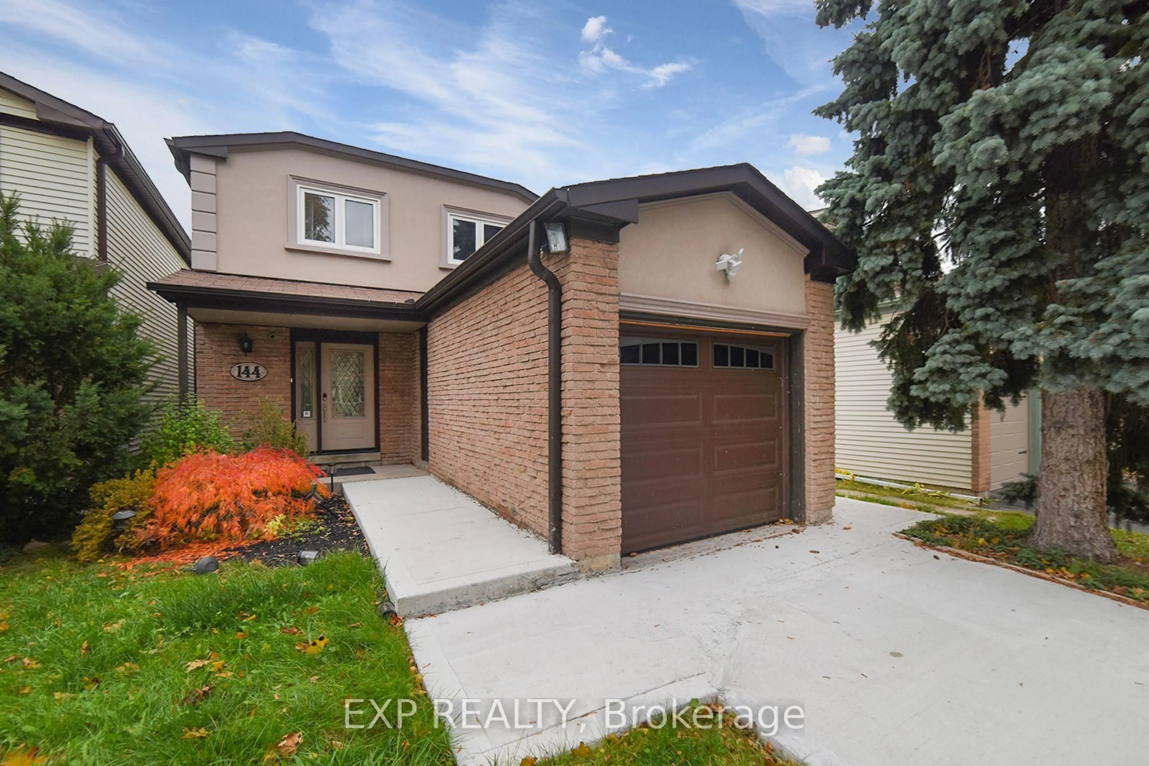 Home with brick exterior material, street for 144 Snowshoe Cres, Markham Ontario L3T 4M9
