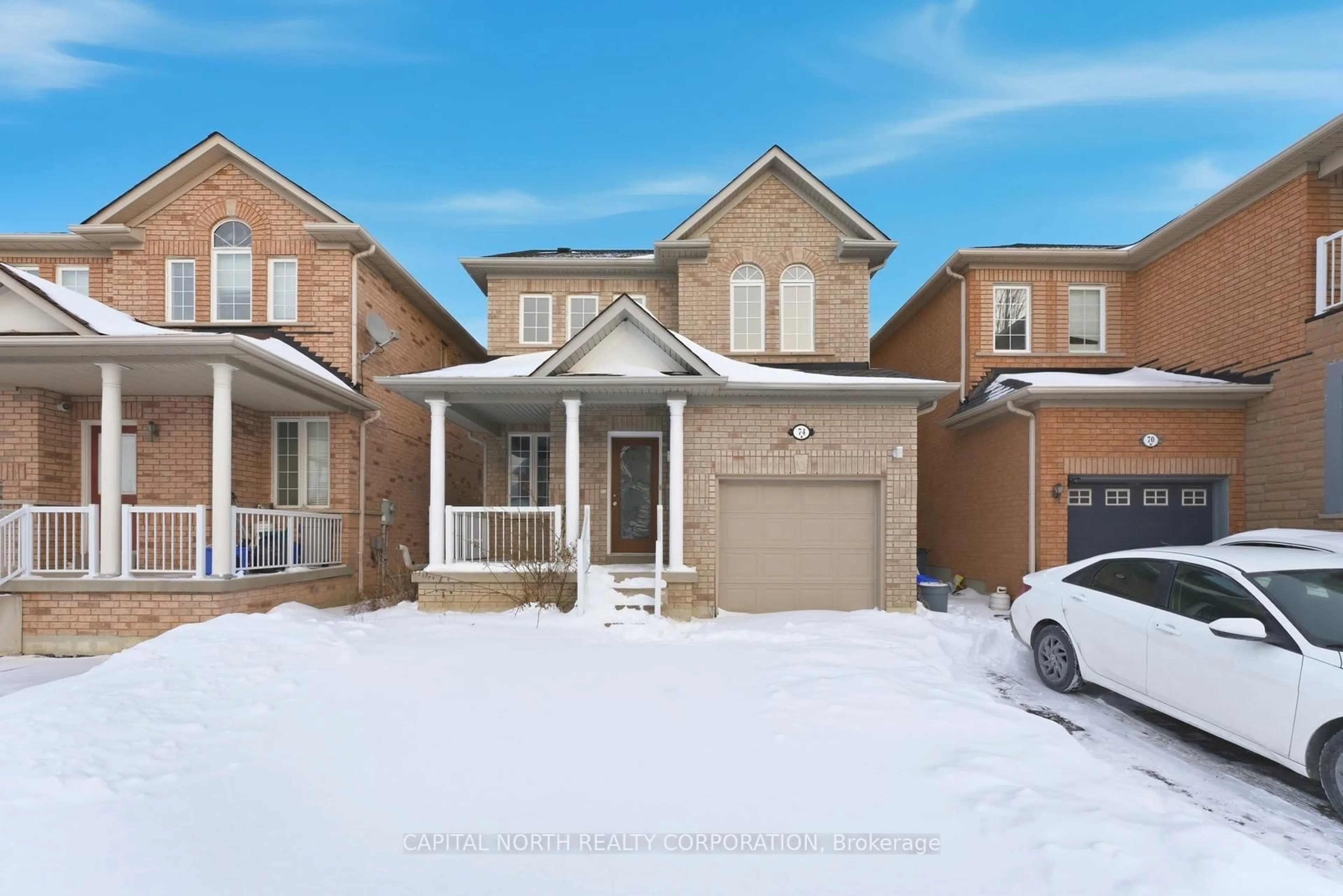 Home with brick exterior material, street for 74 Bullrush Dr, Vaughan Ontario L4H 2V8