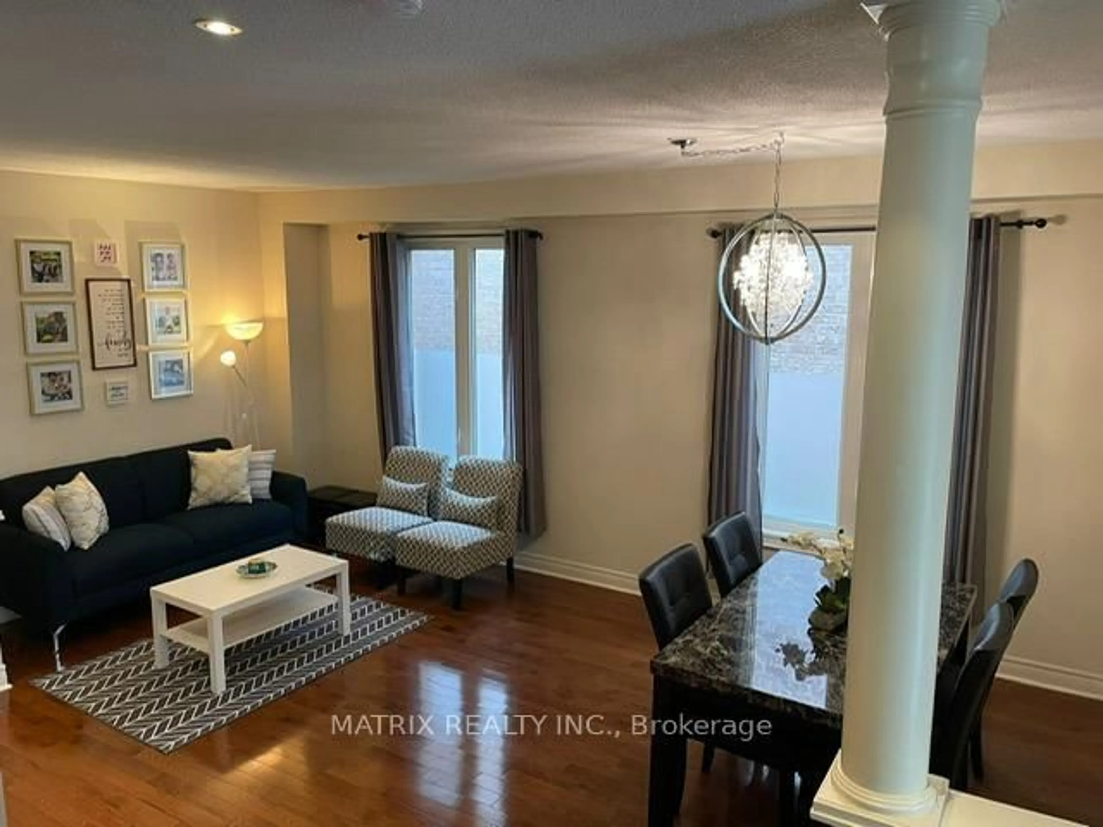 Living room with furniture, wood/laminate floor for 69 Ken Laushway Ave, Whitchurch-Stouffville Ontario L4A 0J3