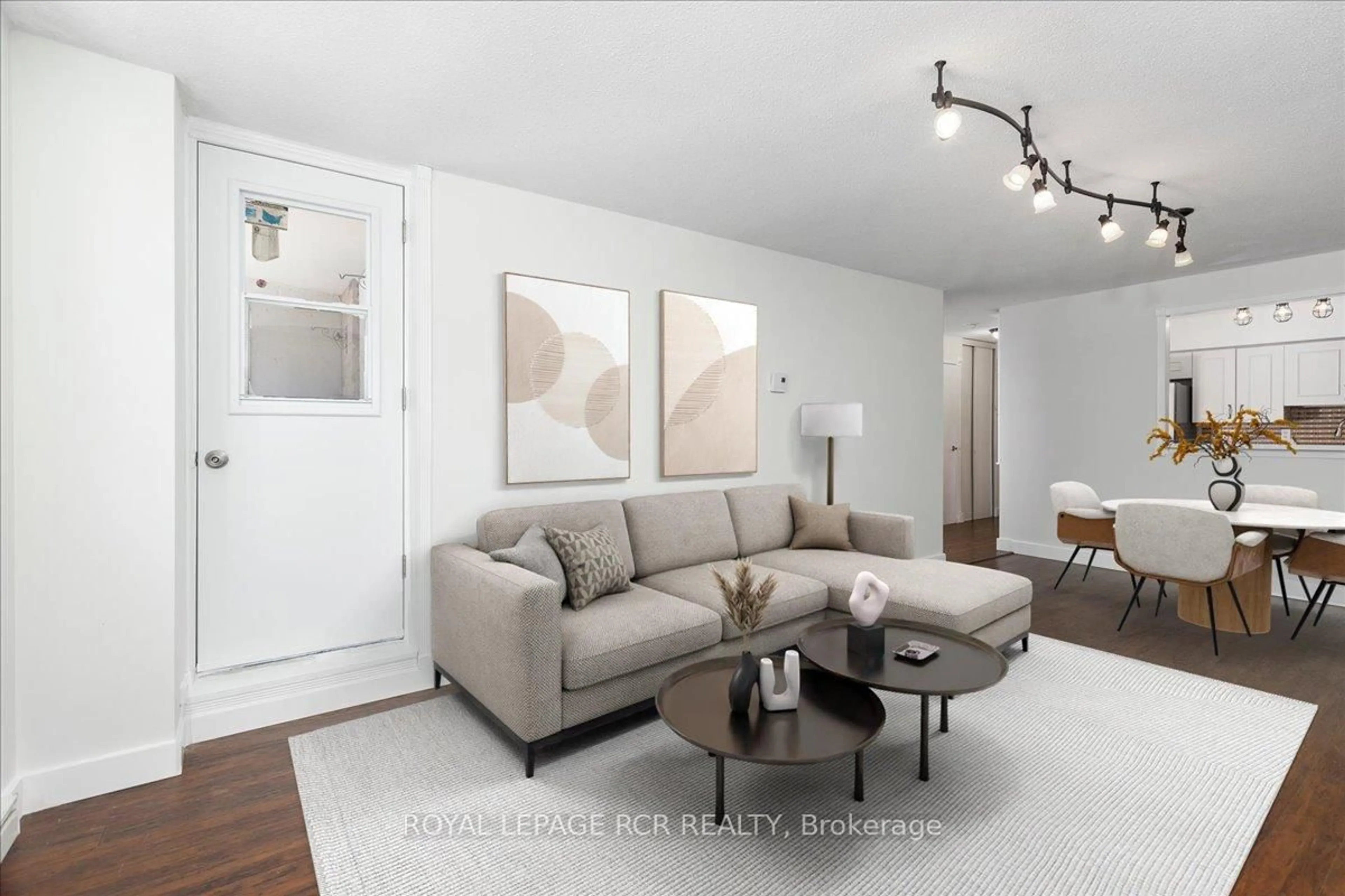 Living room with furniture, wood/laminate floor for 260 Davis Dr #508, Newmarket Ontario L3Y 7C3