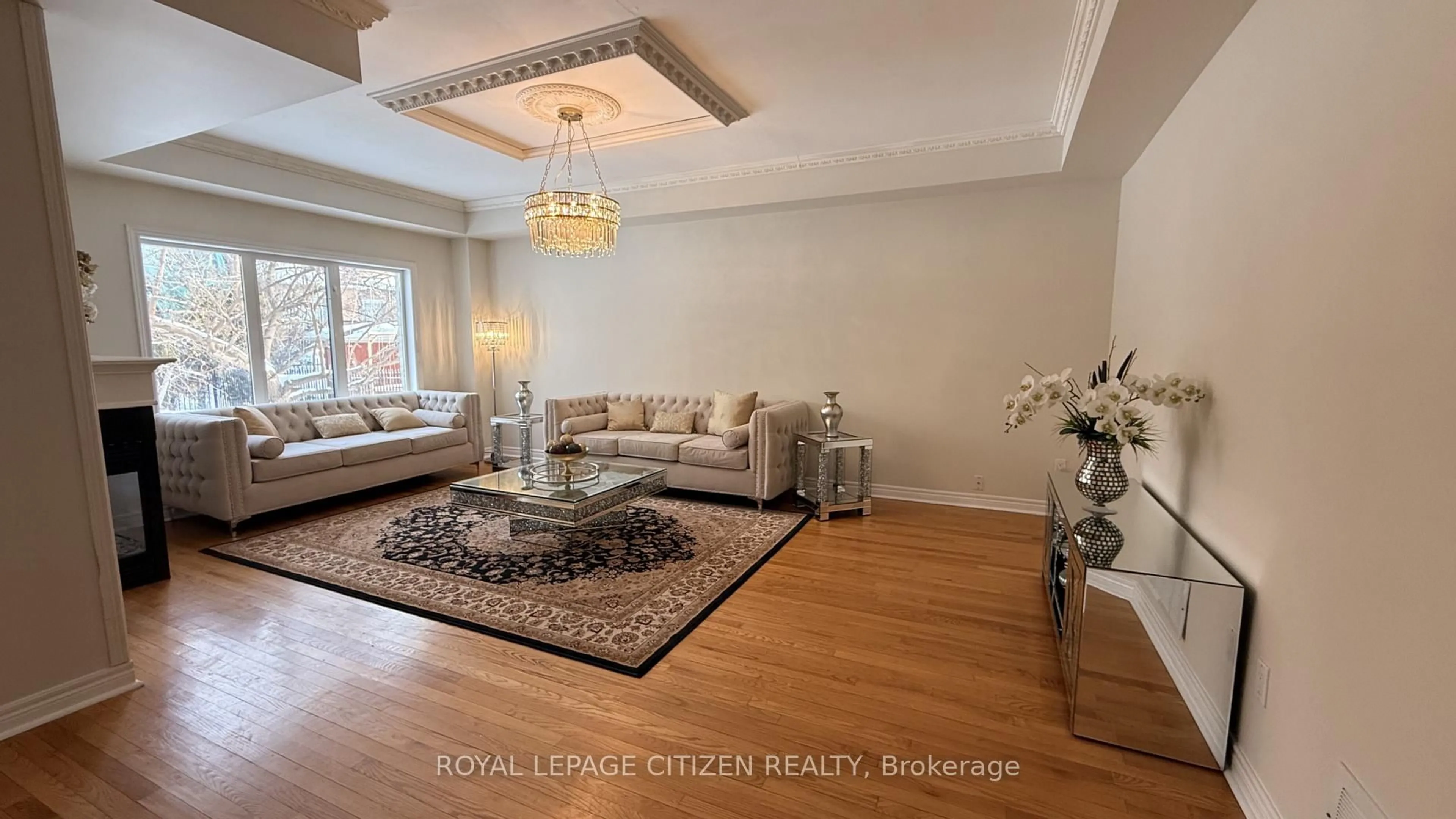 Living room with furniture, wood/laminate floor for 180 Kimber Cres, Vaughan Ontario L4L 9K3