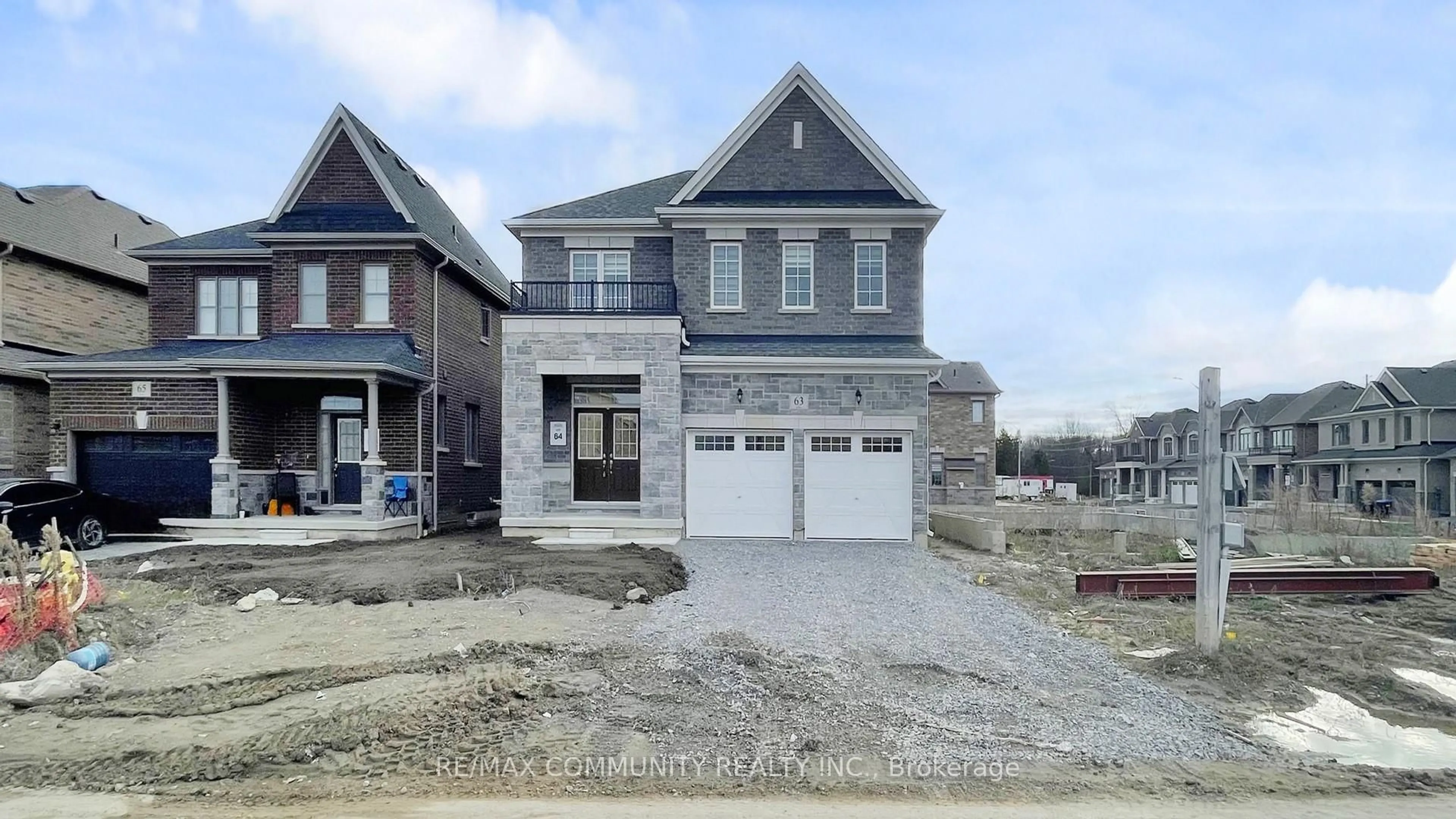 Home with brick exterior material, street for 63 English Dr, New Tecumseth Ontario L0G 1A0