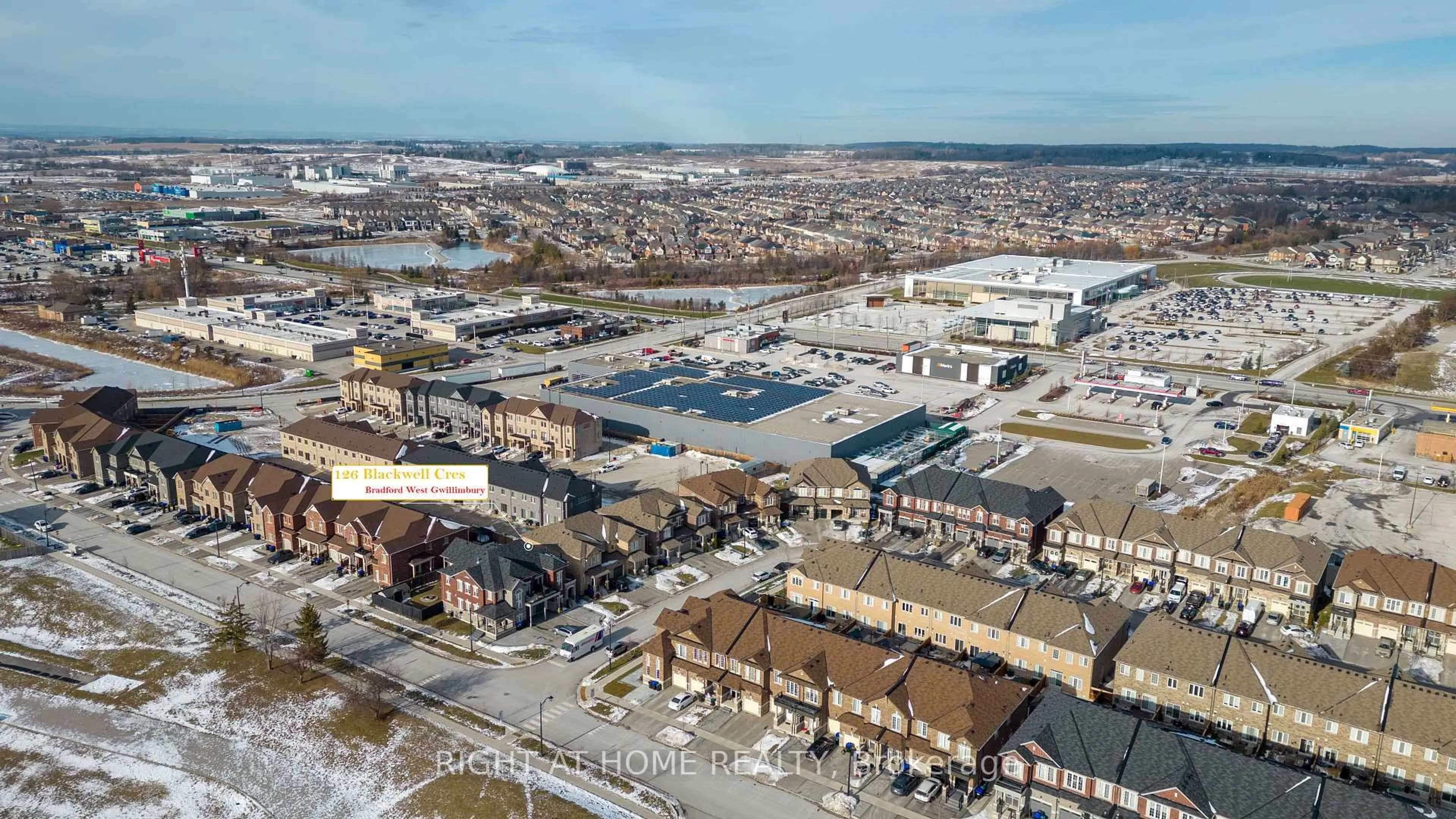 A pic from outside/outdoor area/front of a property/back of a property/a pic from drone, street for 126 Blackwell Cres, Bradford West Gwillimbury Ontario L3Z 4L3