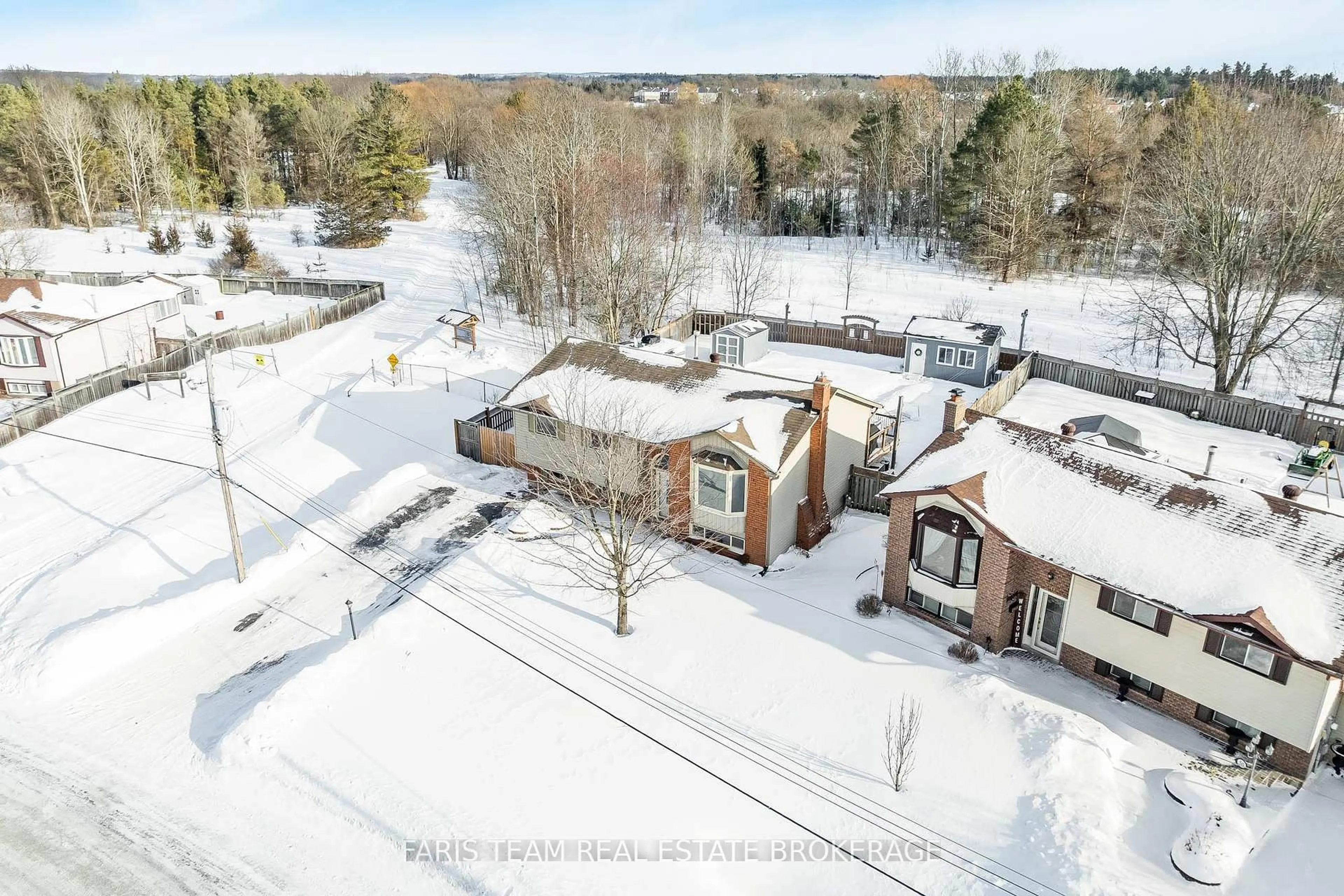 A pic from outside/outdoor area/front of a property/back of a property/a pic from drone, unknown for 52 Roth St, Essa Ontario L0M 1B2