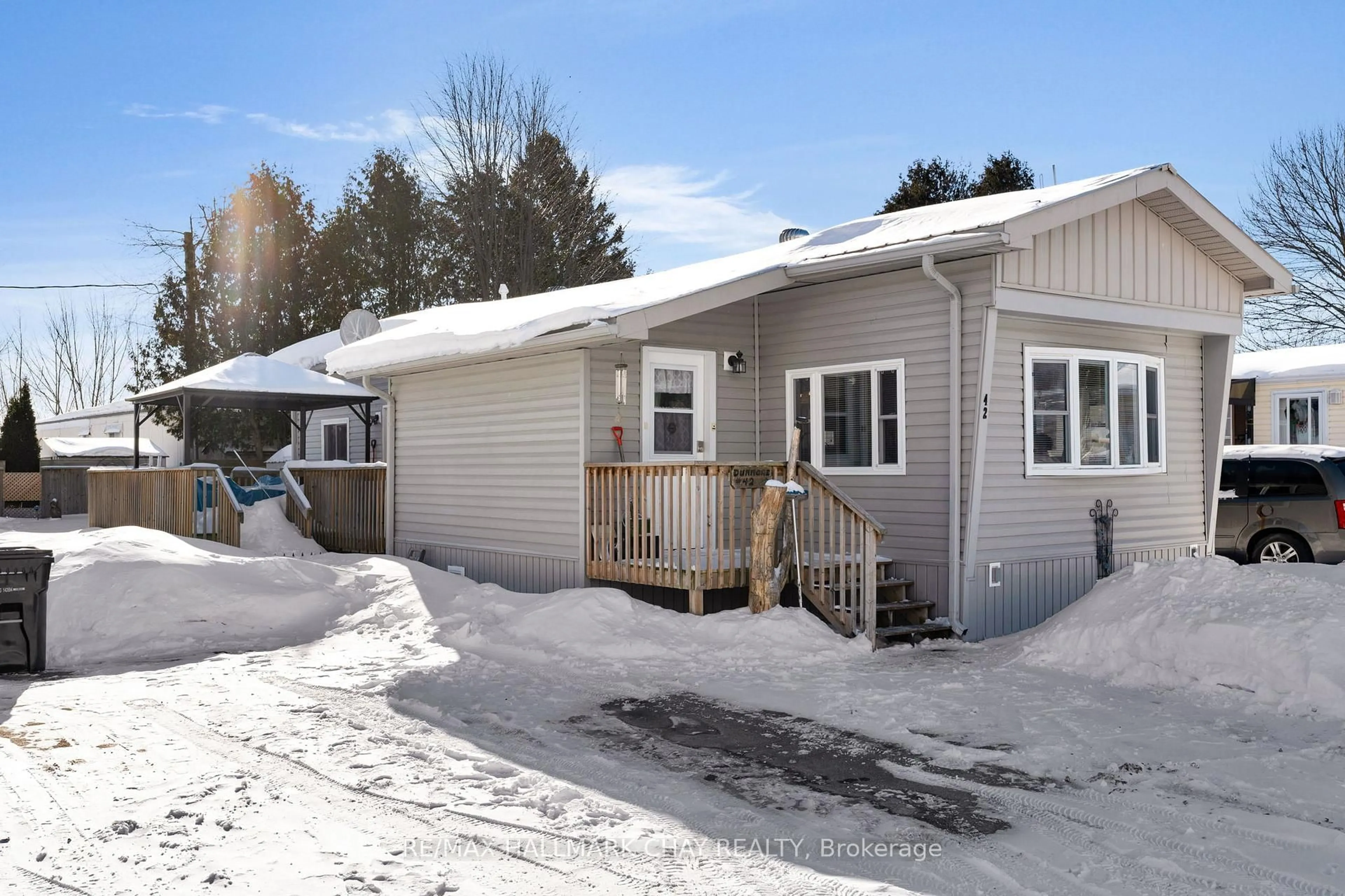 Home with vinyl exterior material, street for 4976 25th Sdrd #42, Essa Ontario L0L 1N0