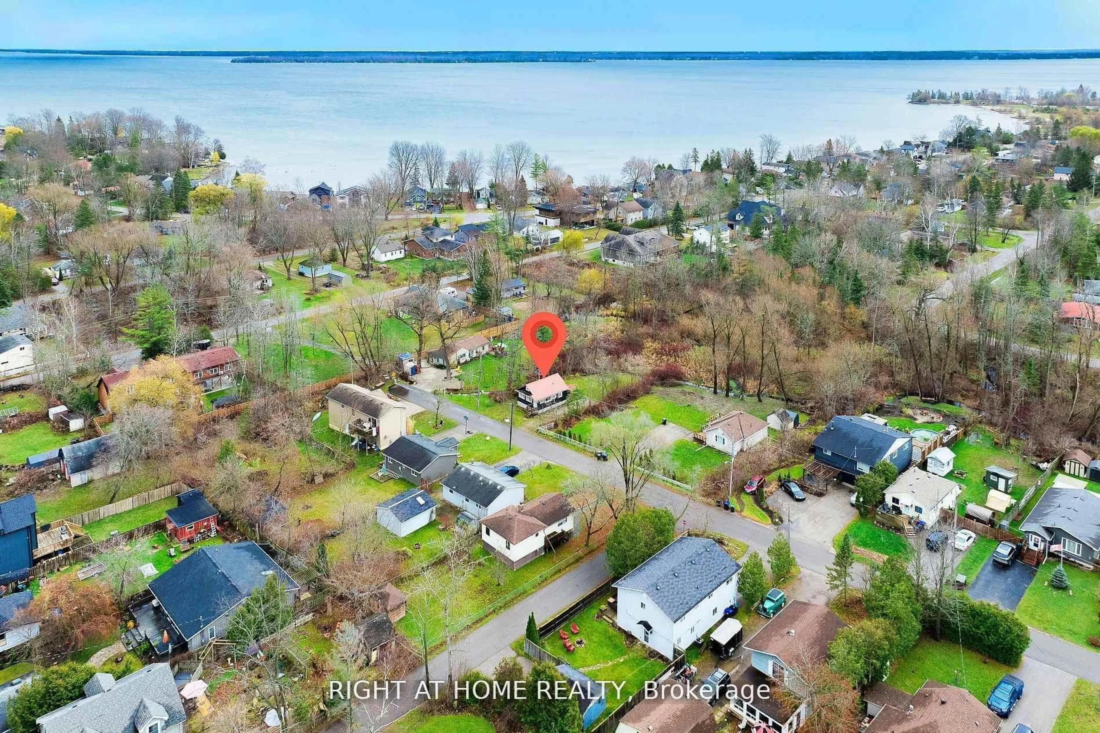A pic from outside/outdoor area/front of a property/back of a property/a pic from drone, water/lake/river/ocean view for 685 Reid St, Innisfil Ontario L9S 2E9