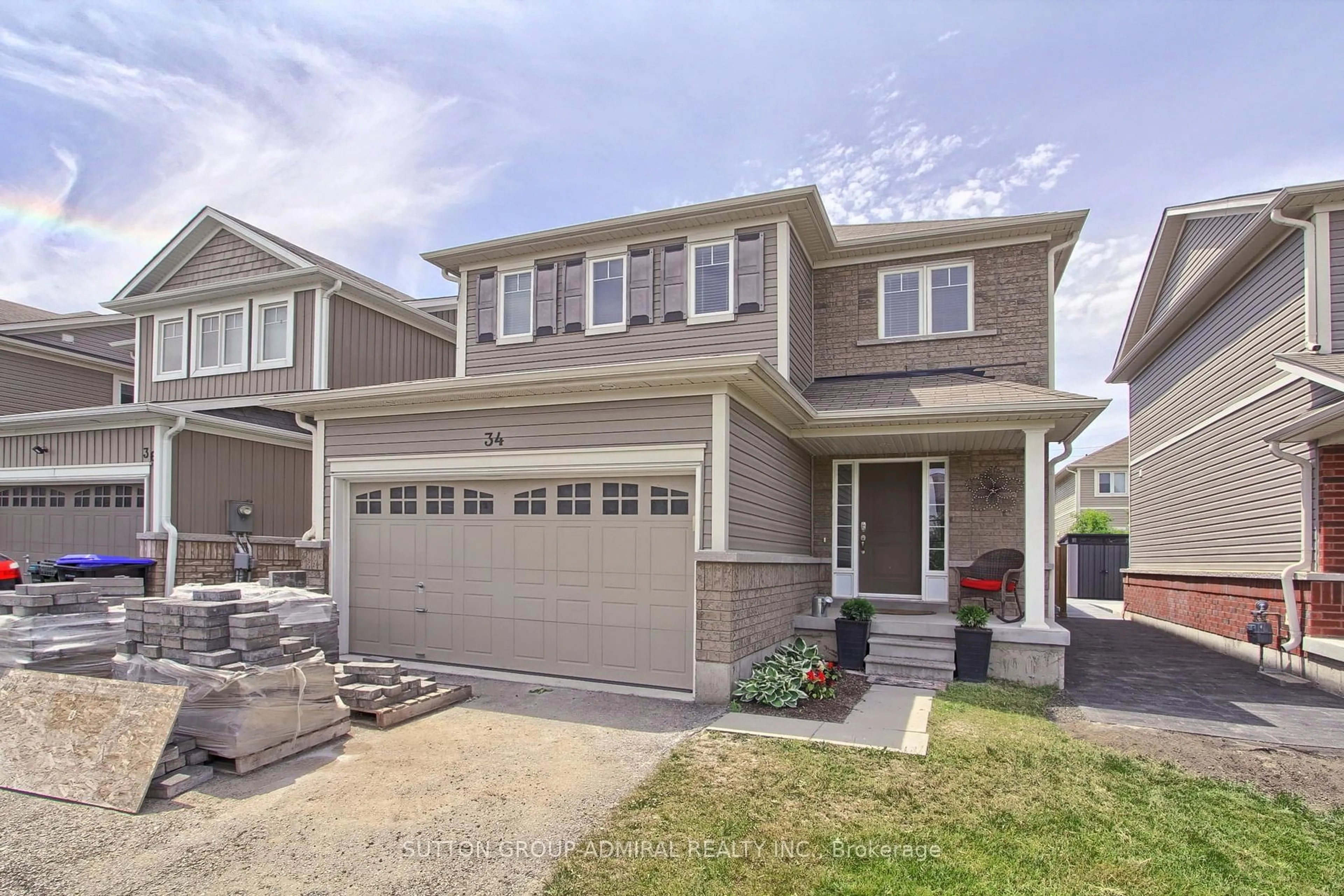 Home with vinyl exterior material, street for 34 Milne St, New Tecumseth Ontario L9R 0A6