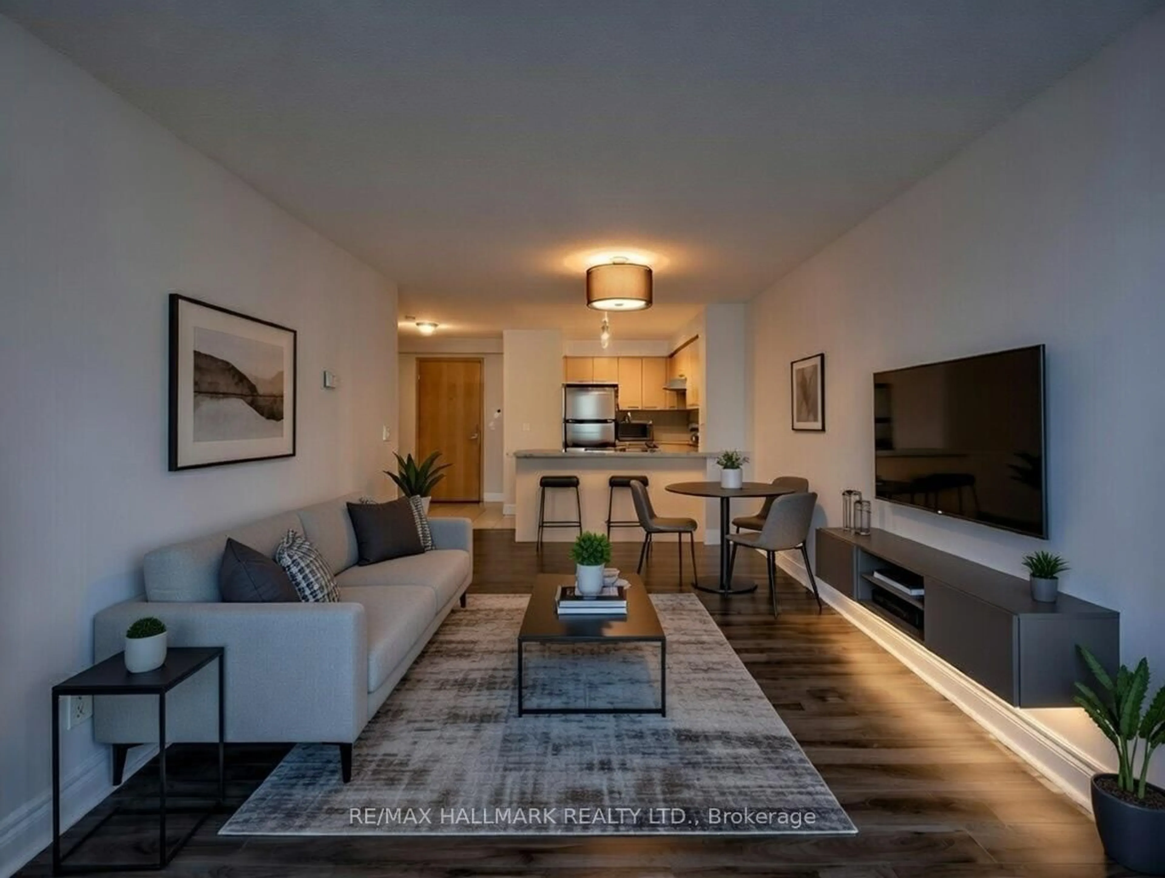 Living room with furniture, wood/laminate floor for 48 Suncrest Blvd #616, Markham Ontario L3T 7Y5