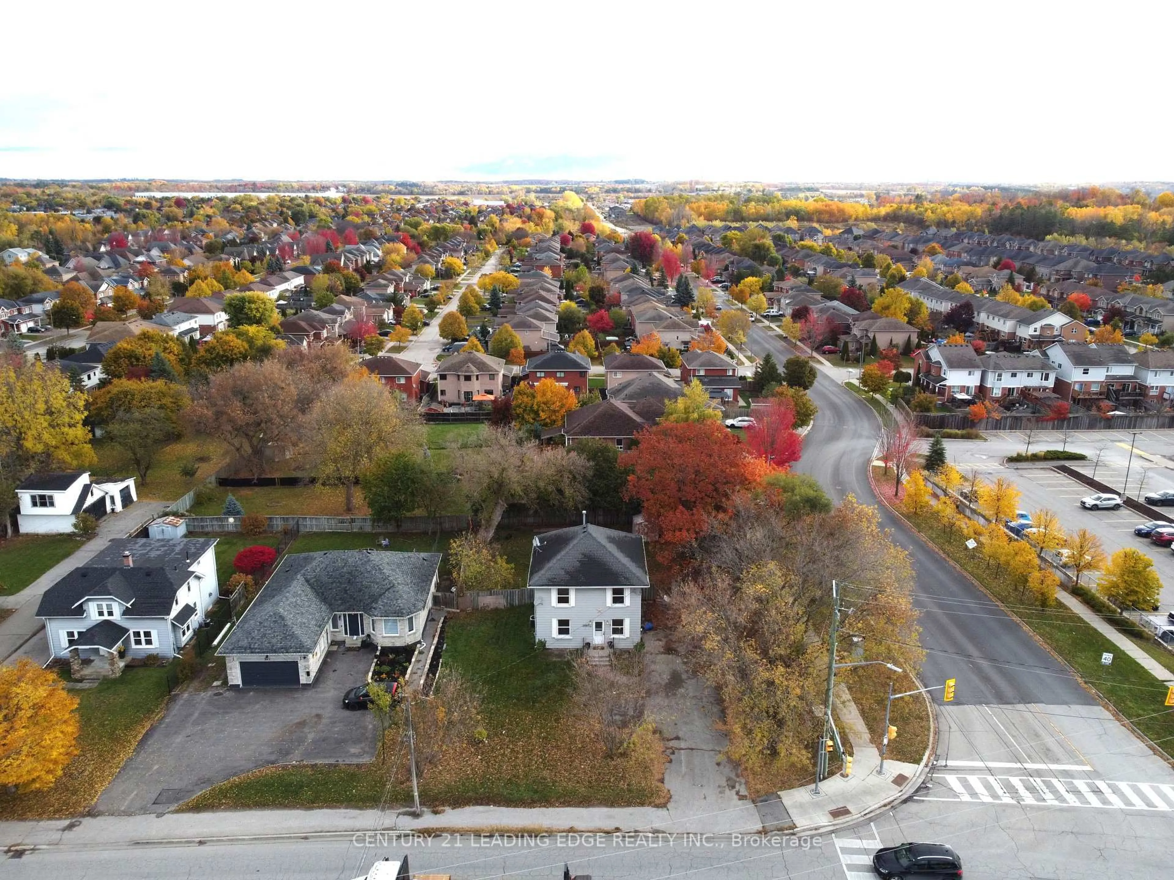 A pic from outside/outdoor area/front of a property/back of a property/a pic from drone, street for 399 The Queensway South, Georgina Ontario L4P 2C6