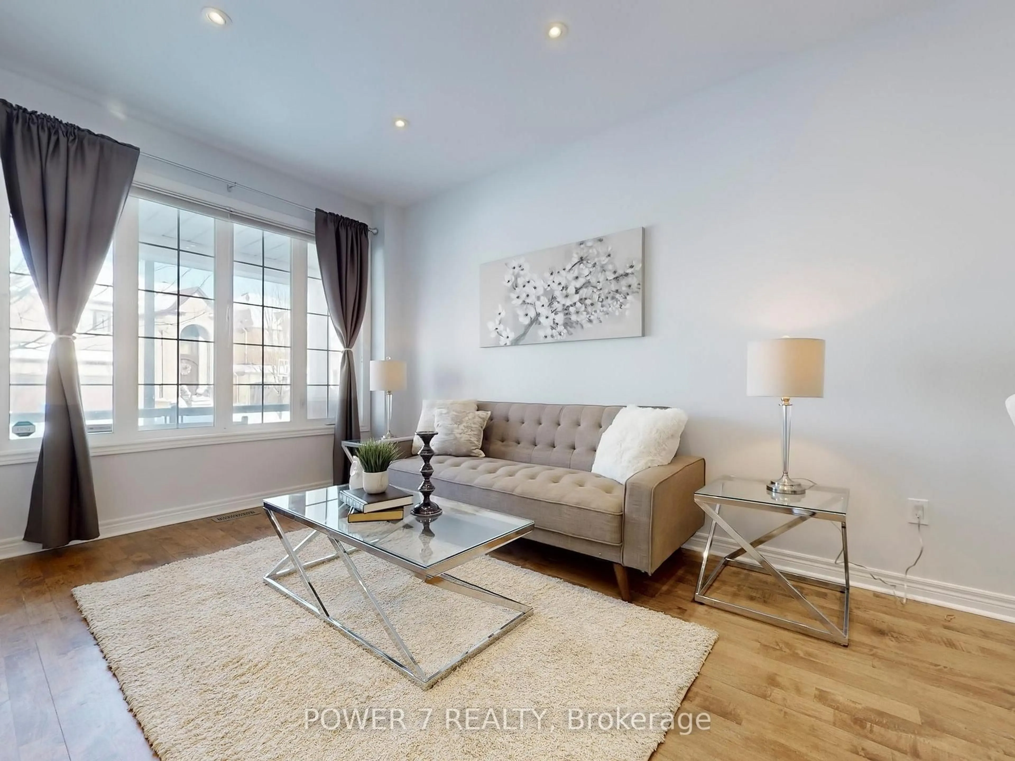 Living room with furniture, wood/laminate floor for 3 Demoray Crt, Markham Ontario L6E 2E8