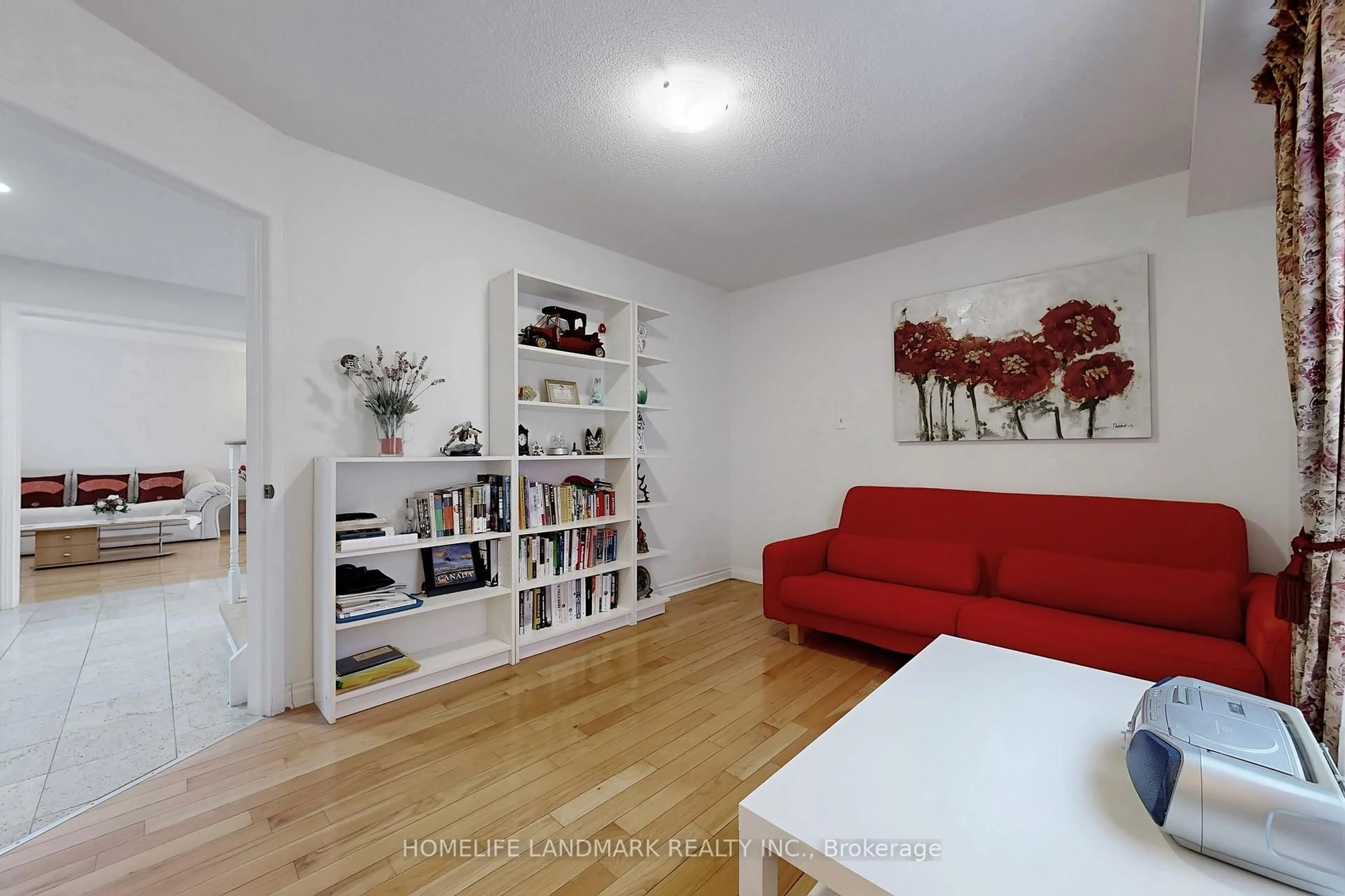 Living room with furniture, wood/laminate floor for 7 Lancashire Rd, Markham Ontario L3R 8K9