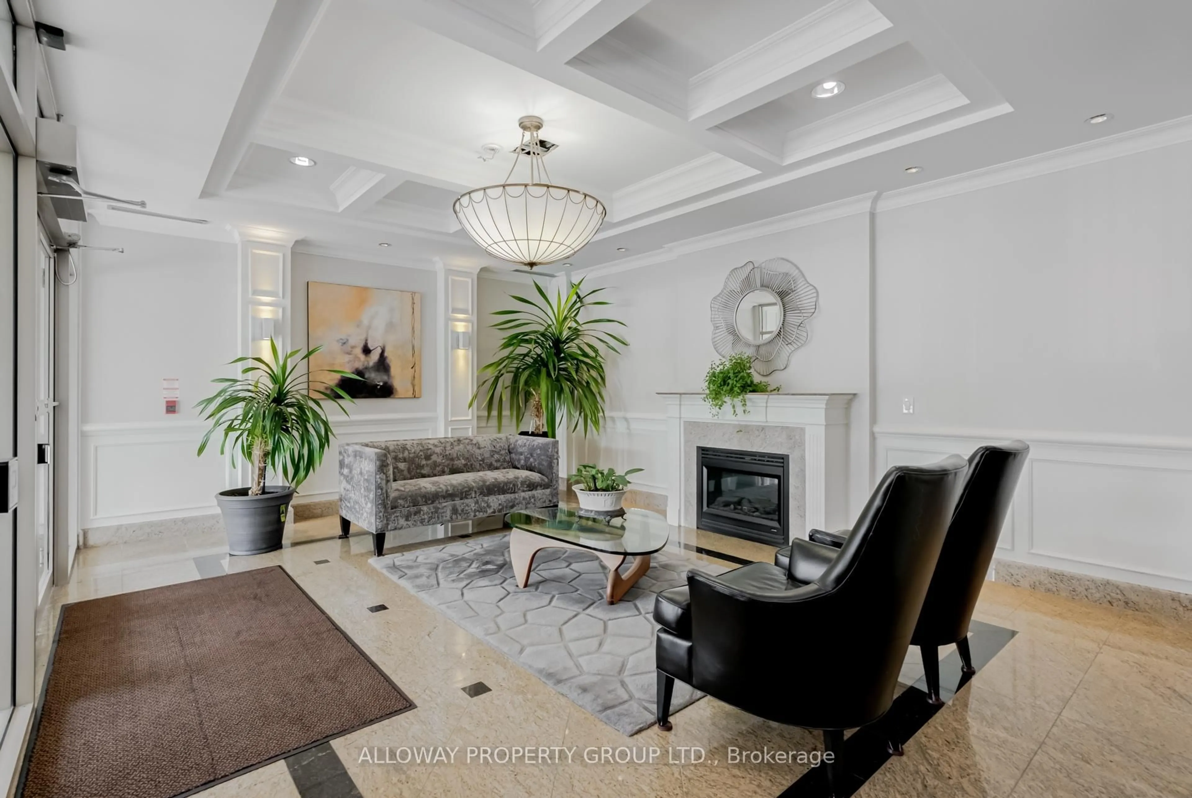 Living room with furniture, unknown for 130 Pond Dr #103, Markham Ontario L3T 7W5