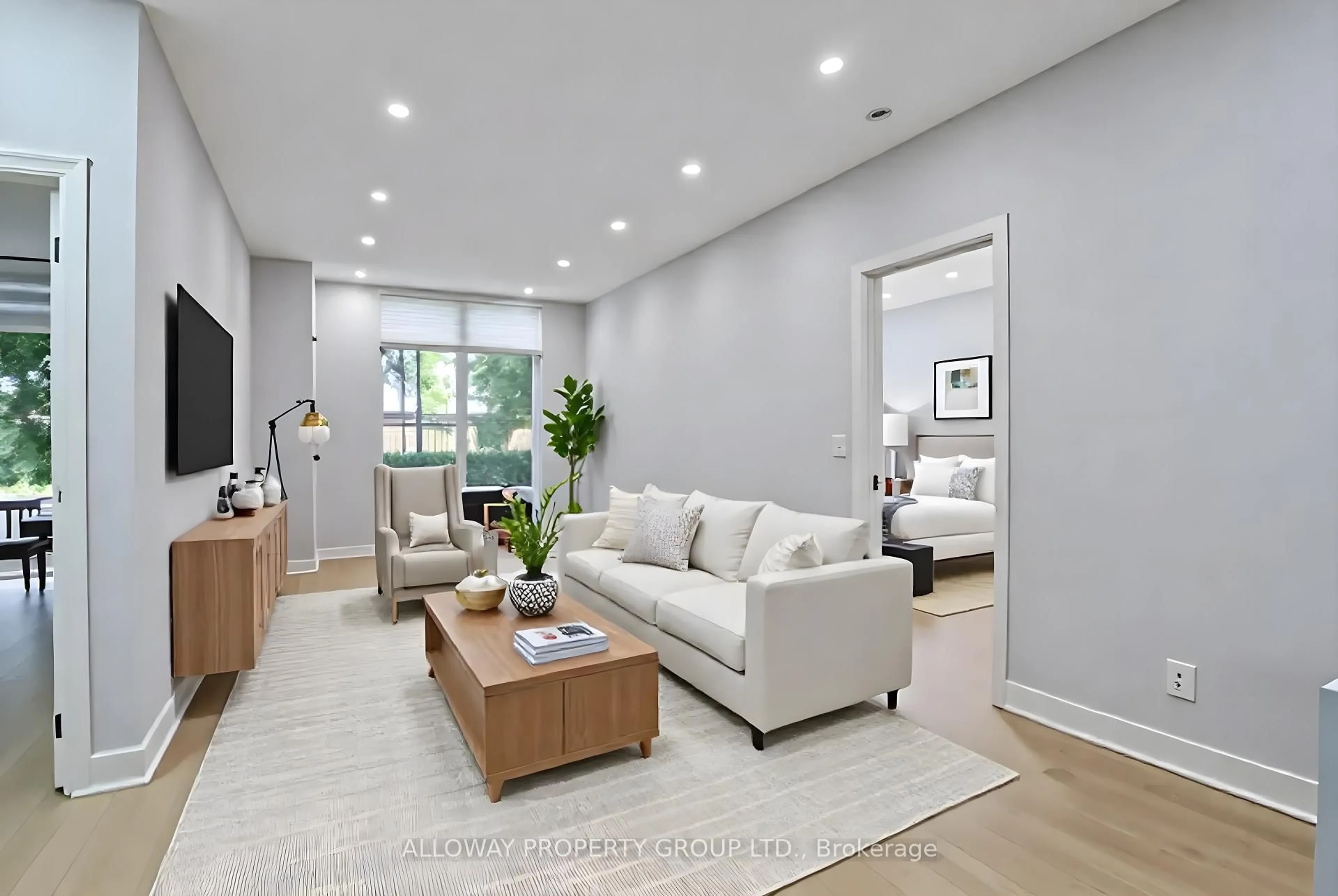 Living room with furniture, unknown for 130 Pond Dr #103, Markham Ontario L3T 7W5