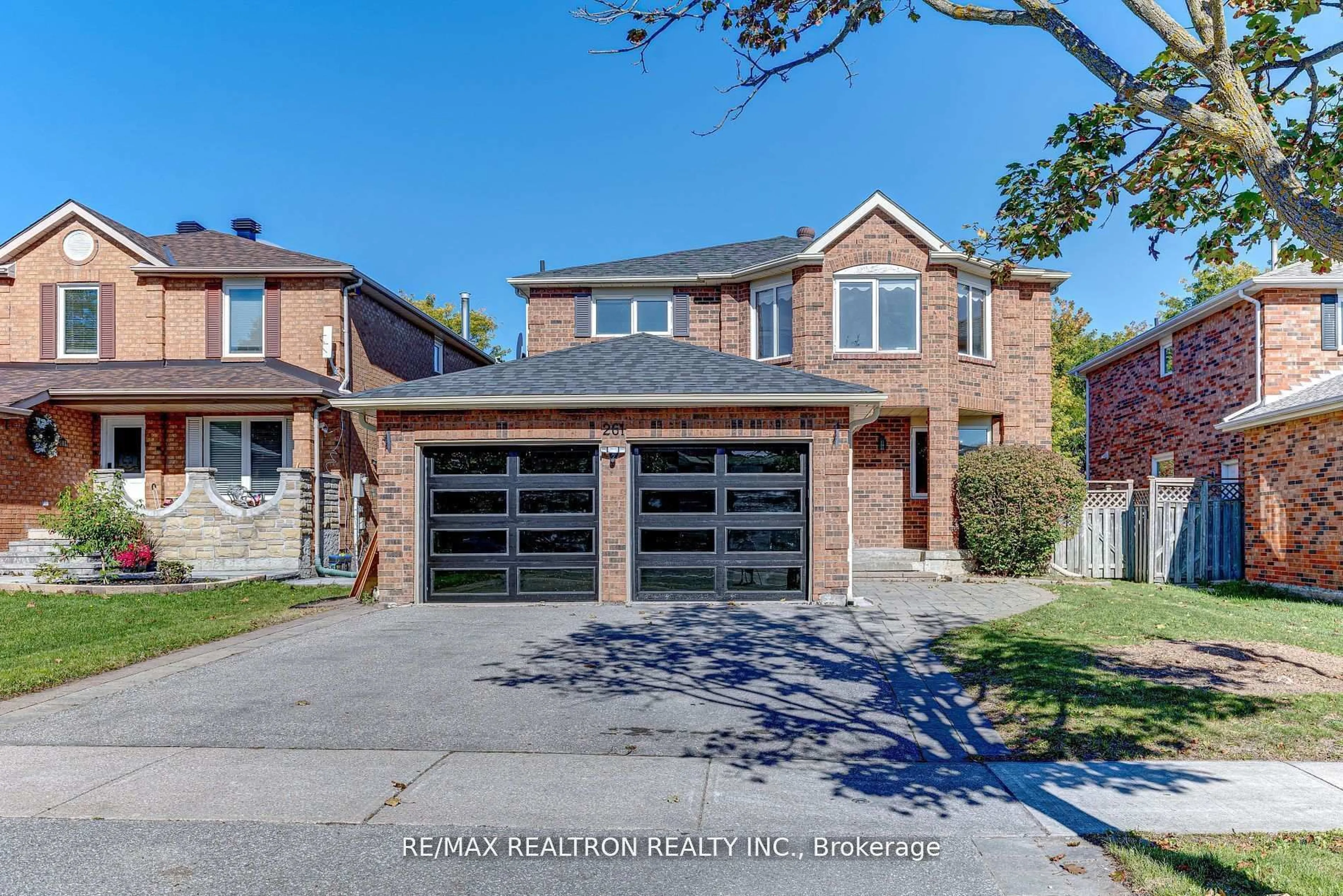 Home with brick exterior material, street for 261 Hollingham Rd, Markham Ontario L3R 8J7