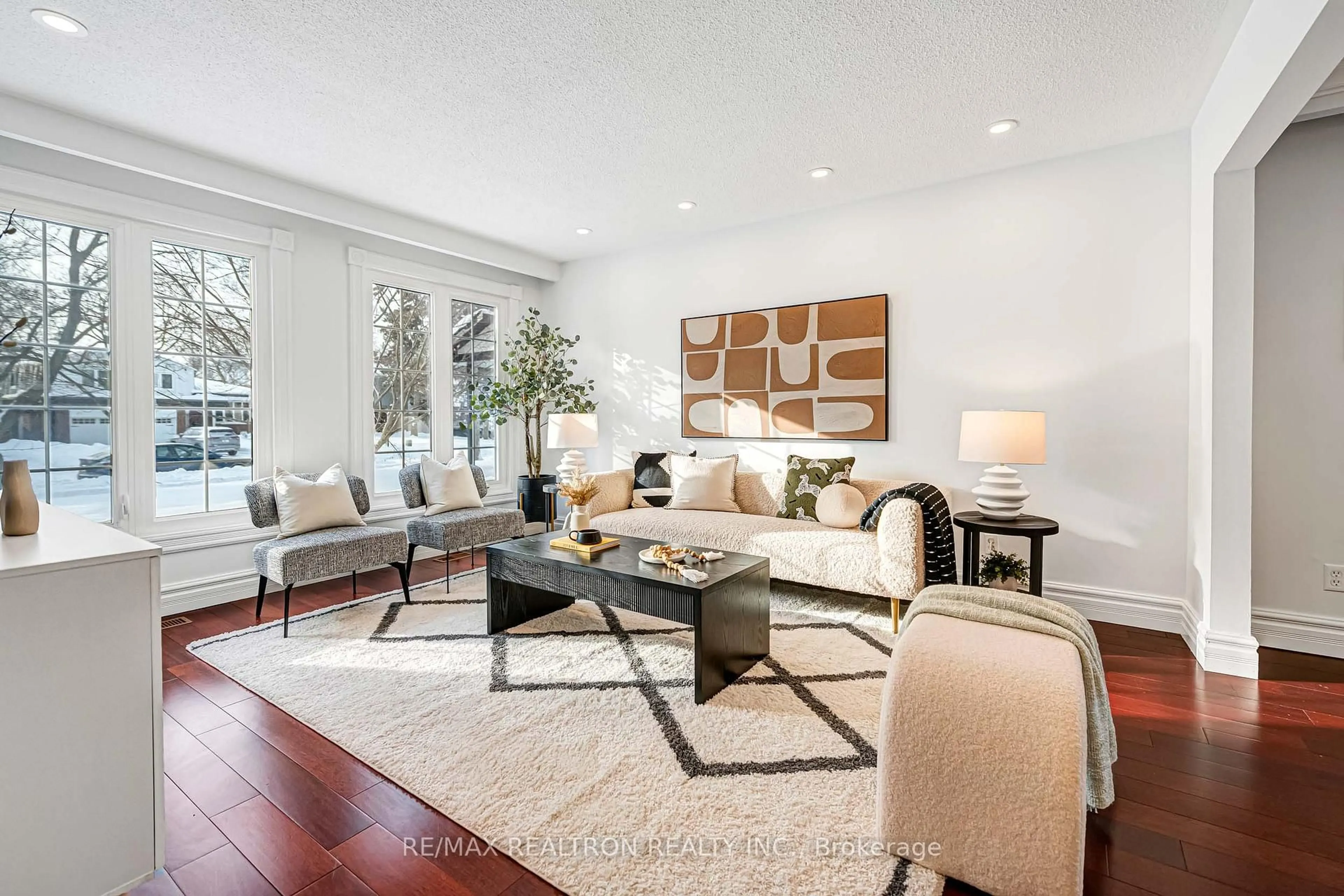 Living room with furniture, wood/laminate floor for 40 Ferrah St, Markham Ontario L3R 1N5