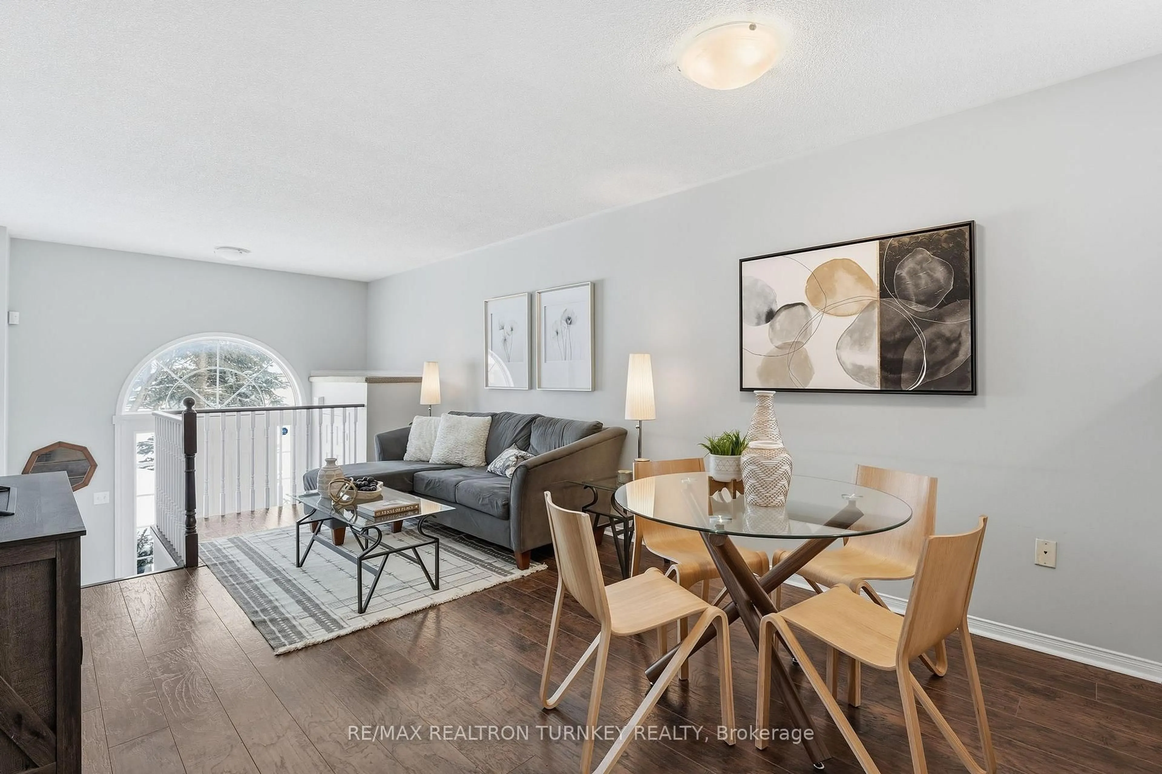 Living room with furniture, wood/laminate floor for 78 Clearmeadow Blvd, Newmarket Ontario L3X 2M6