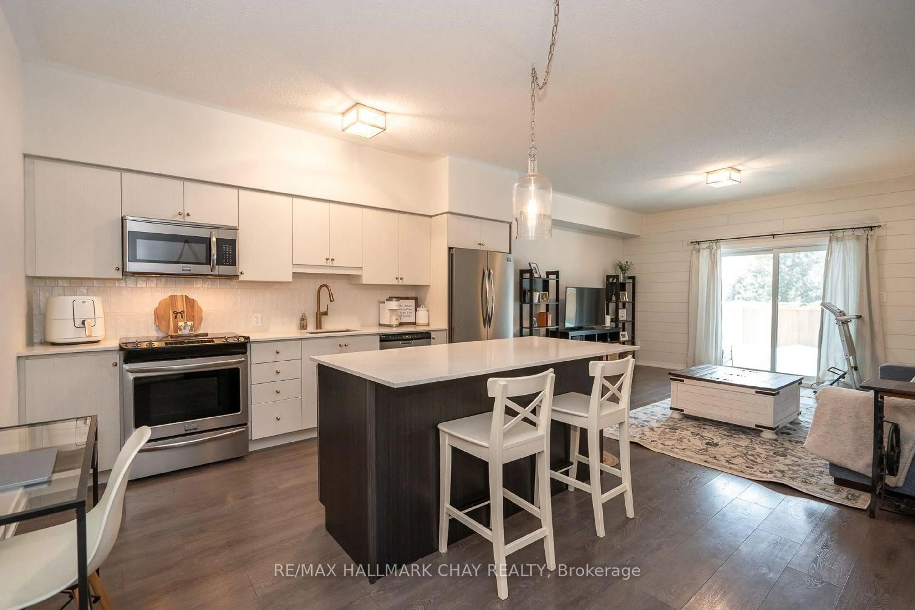 Open concept kitchen, unknown for 69 Boyne St #105, New Tecumseth Ontario L9R 0N5