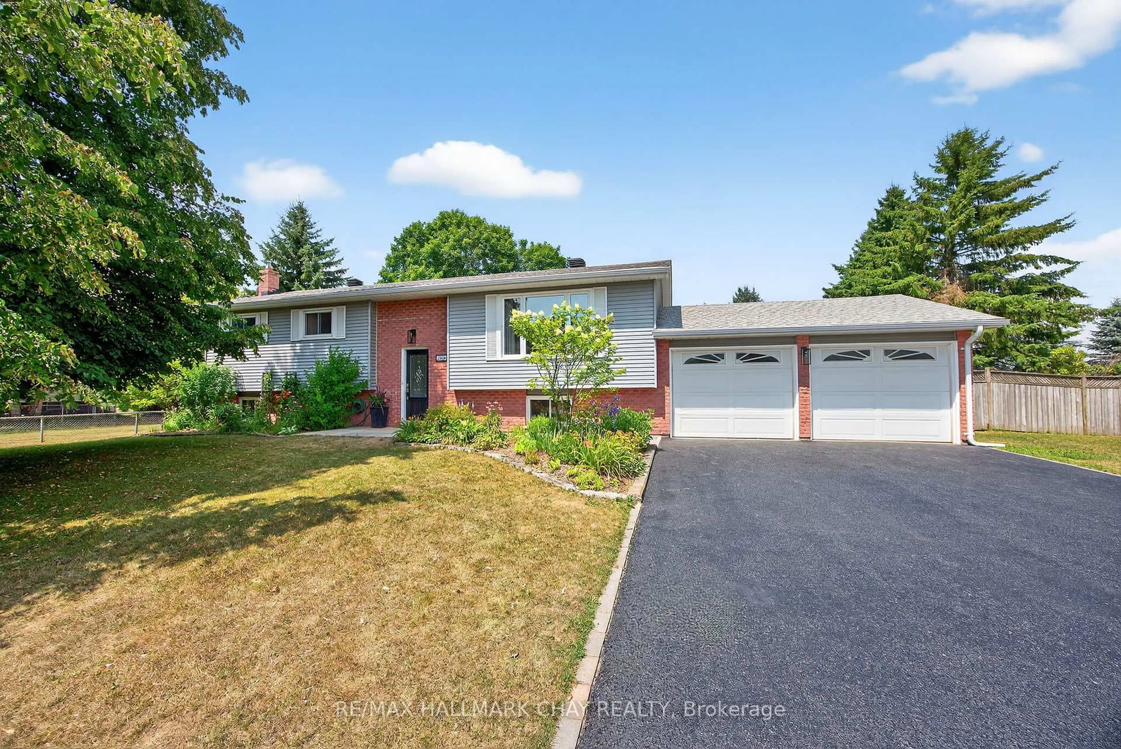 Home with vinyl exterior material, street for 206 North Ridge Rd, Essa Ontario L0L 2N0