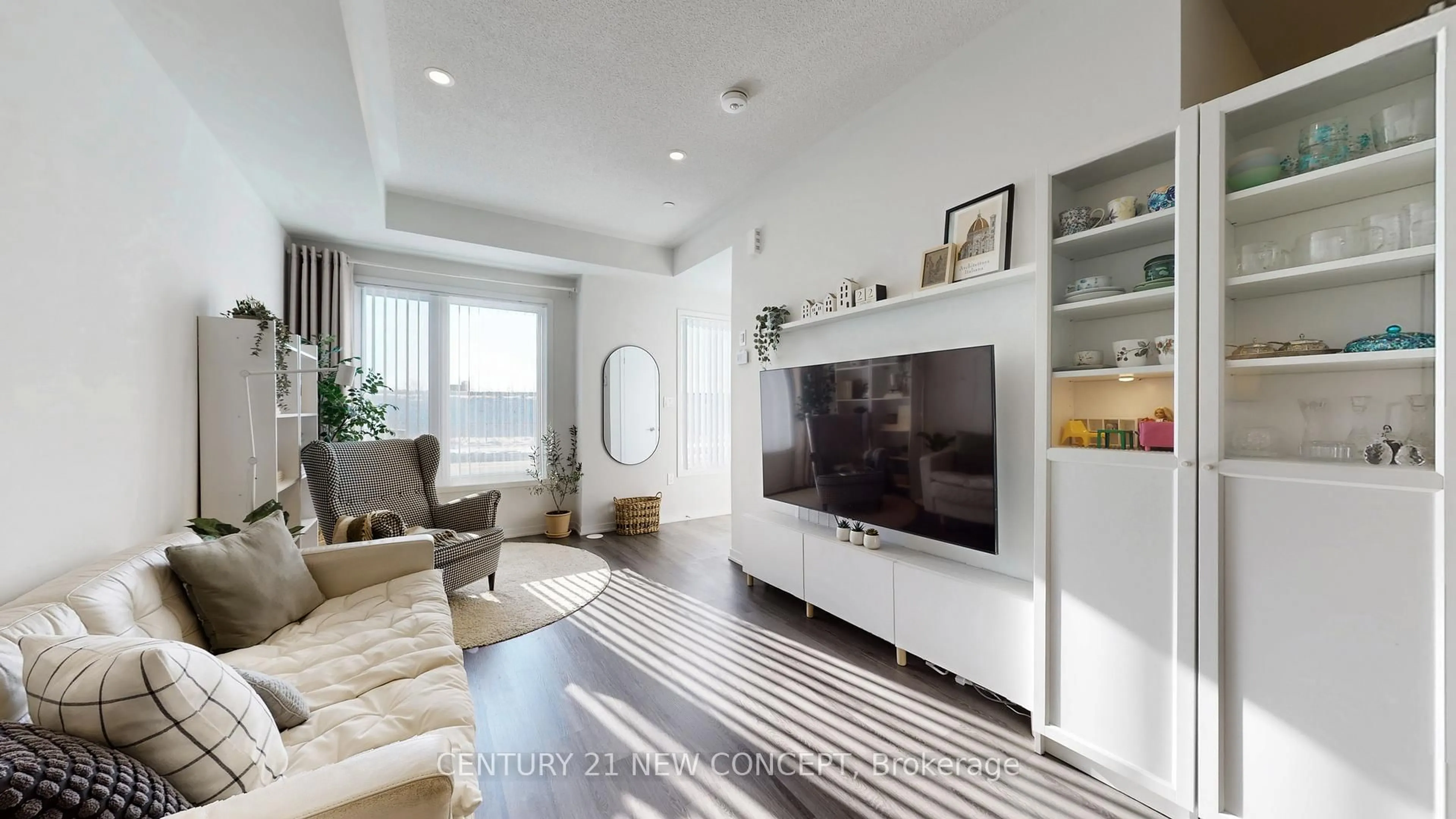 Living room with furniture, wood/laminate floor for 140 Honeycrisp Cres #TH 284, Vaughan Ontario L4K 0N7