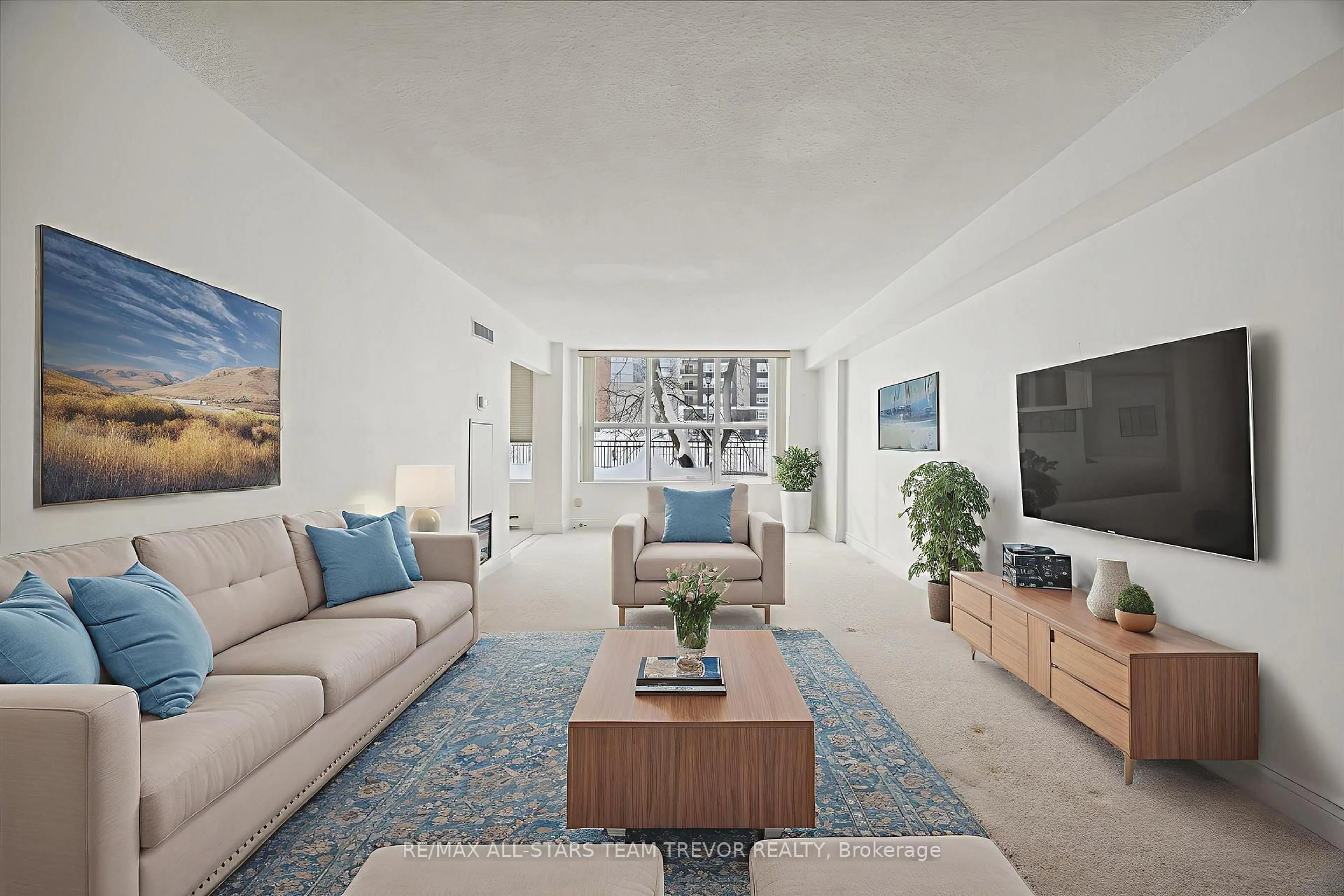 Living room with furniture, unknown for 250 Davis Dr #204, Newmarket Ontario L3Y 7T7