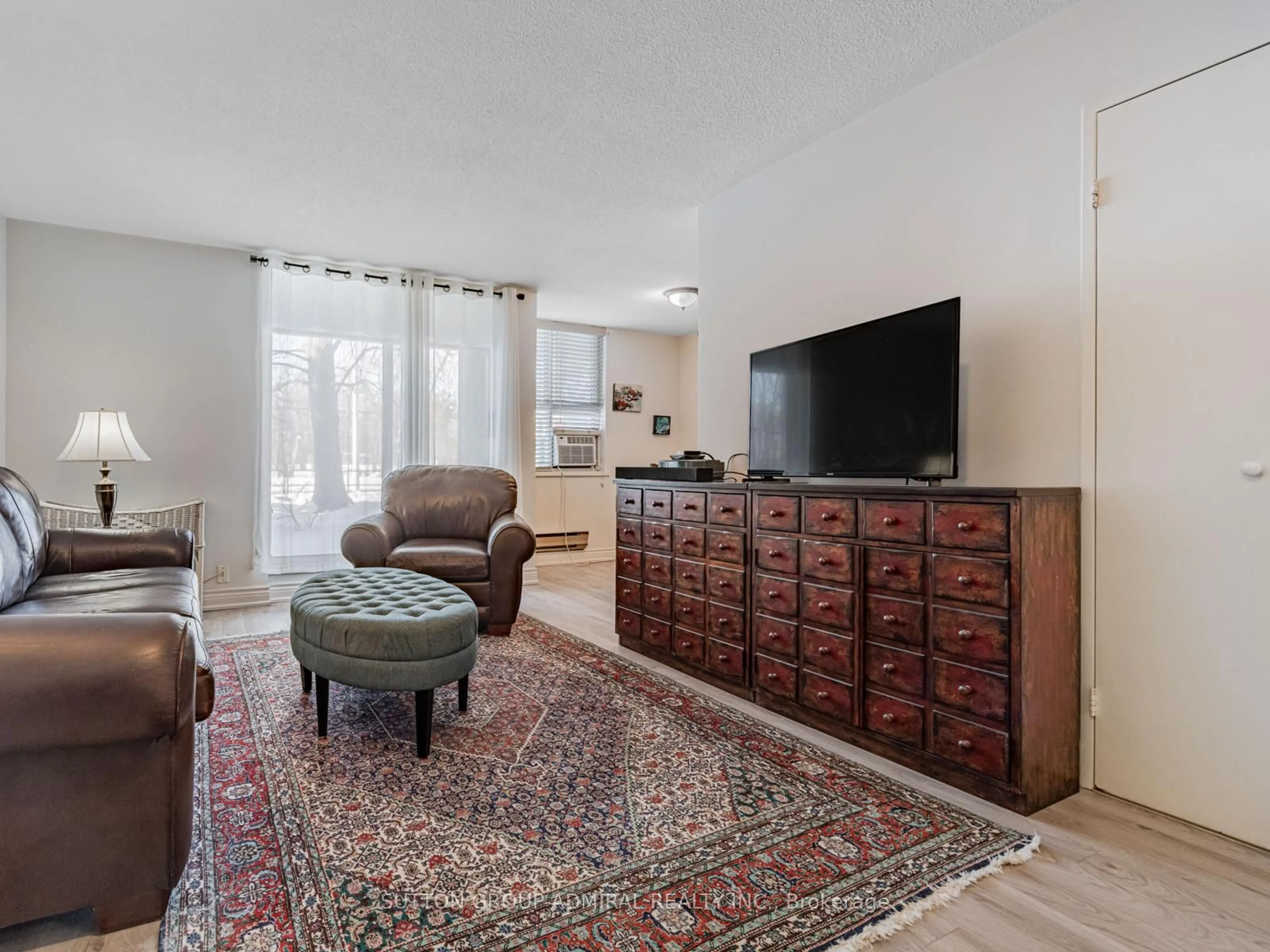 Living room with furniture, unknown for 80 Inverlochy Blvd #108, Markham Ontario L3T 4P3
