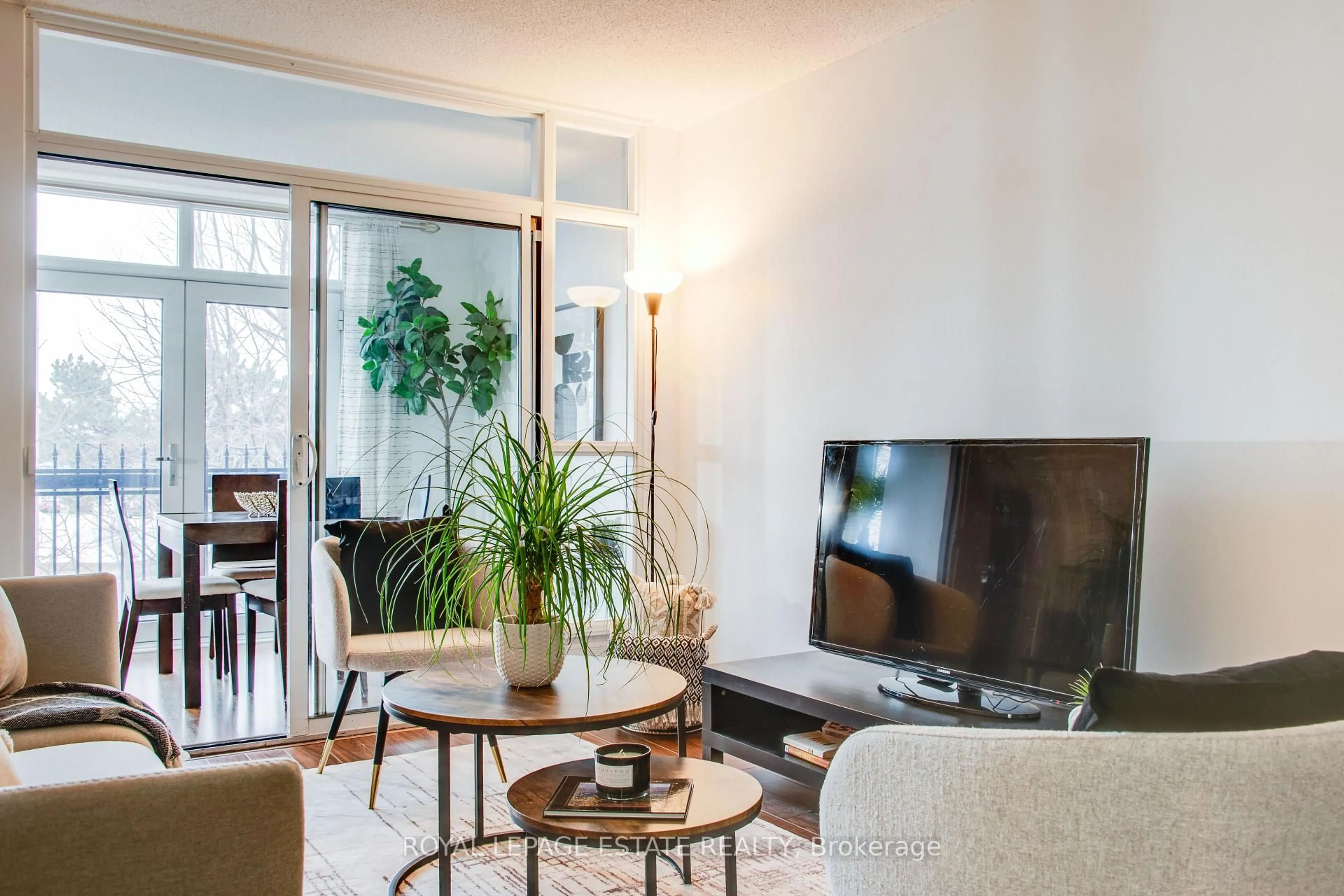 Living room with furniture, unknown for 7363 Kennedy Rd #213, Markham Ontario L3R 1G8