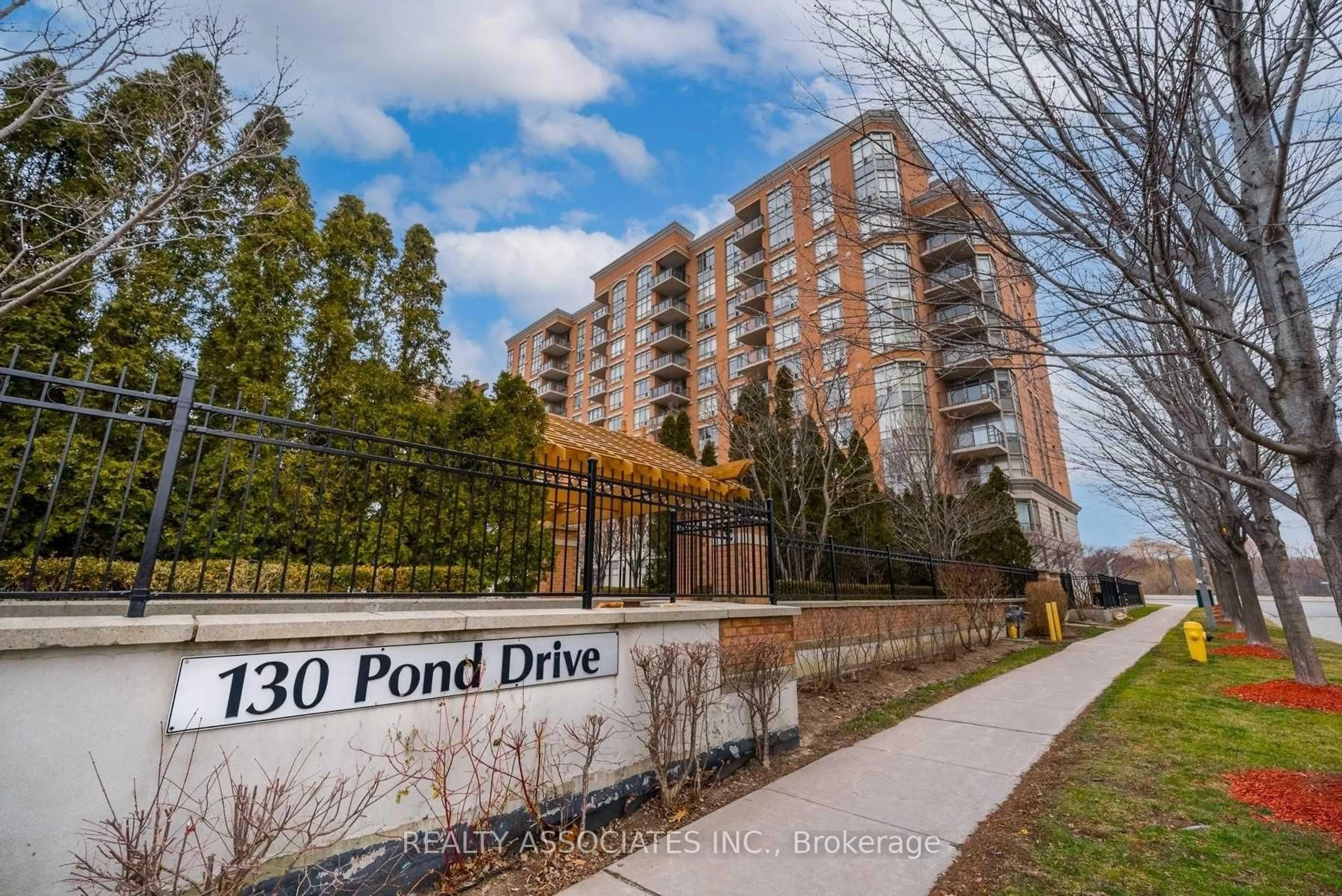 A pic from outside/outdoor area/front of a property/back of a property/a pic from drone, water/lake/river/ocean view for 130 Pond Dr #303, Markham Ontario L3T 7W5