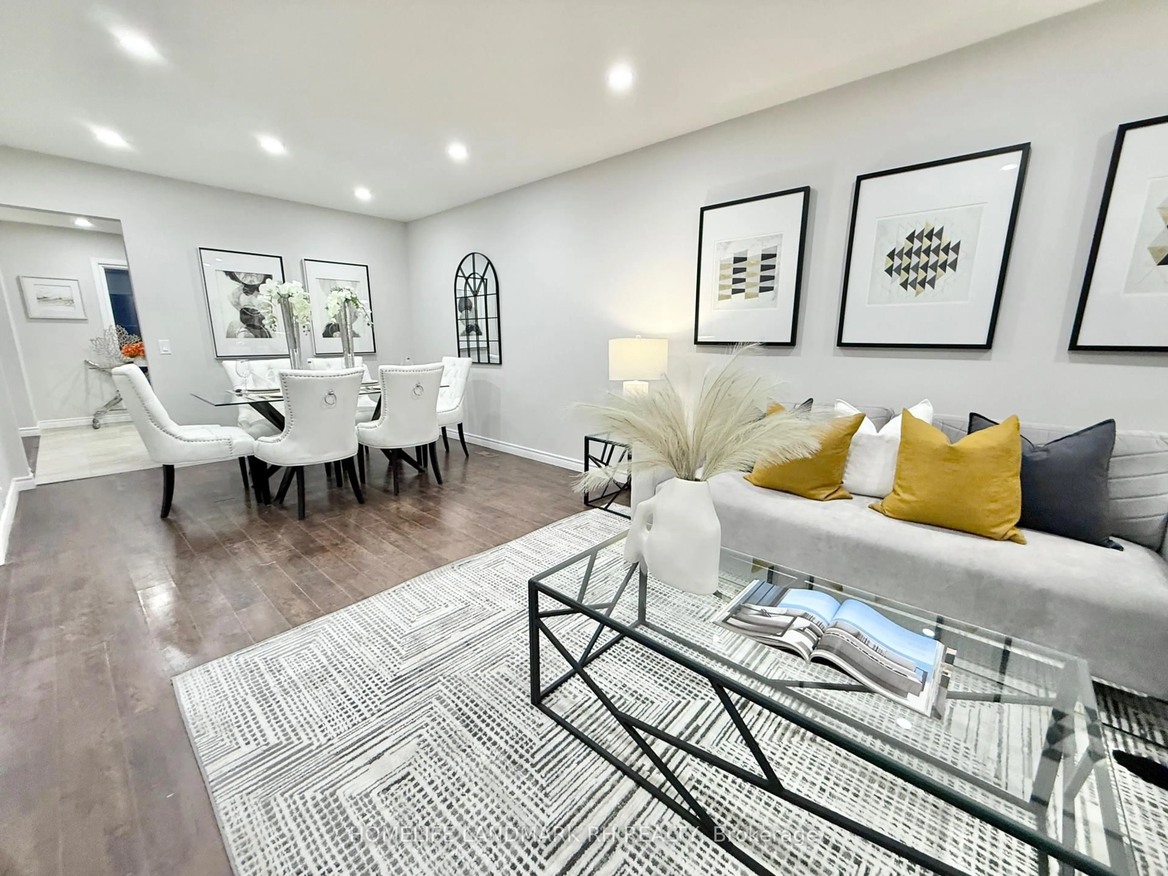 Living room with furniture, wood/laminate floor for 114 Mercer Cres, Markham Ontario L3P 4K4