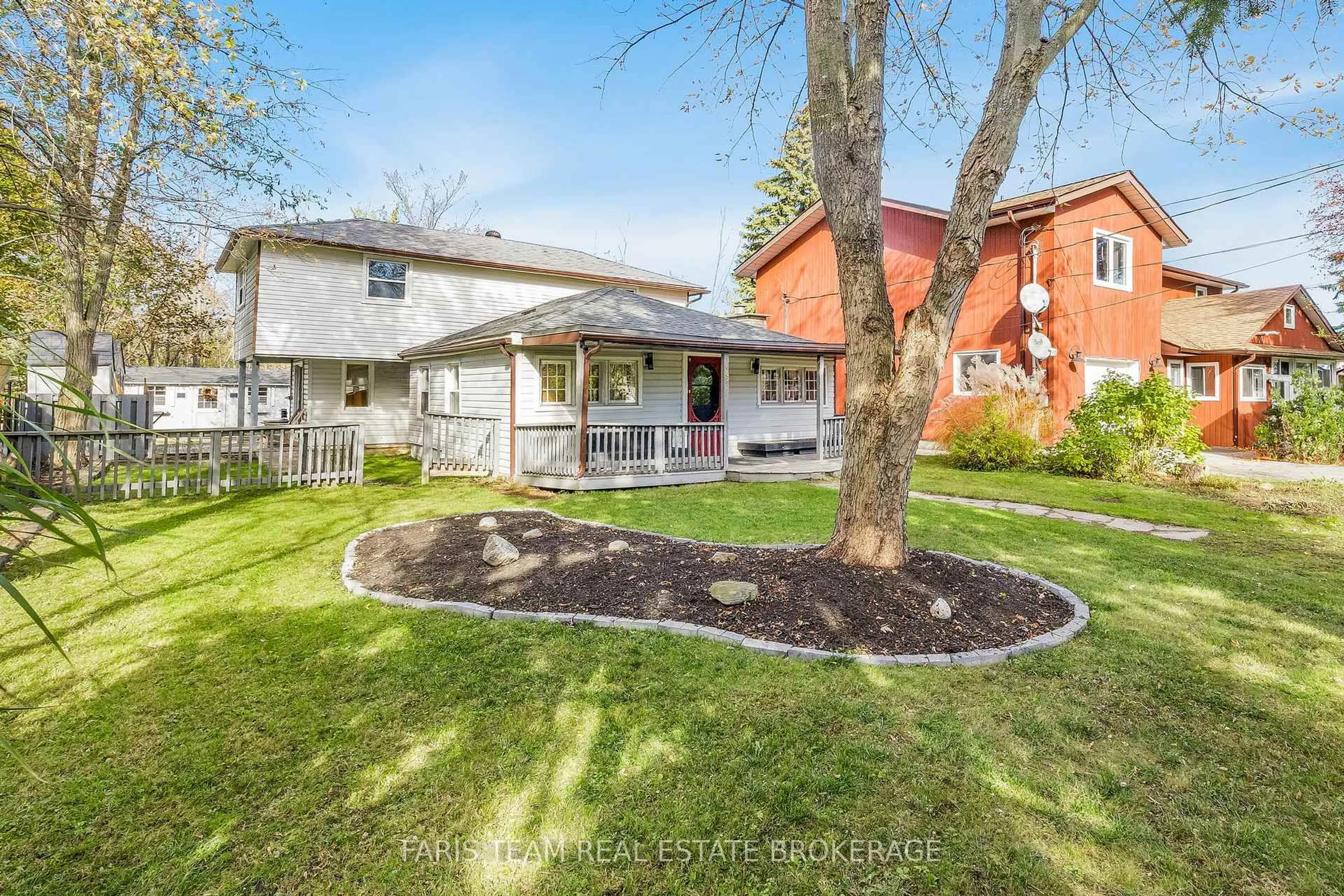 A pic from outside/outdoor area/front of a property/back of a property/a pic from drone, street for 648 10th Line, Innisfil Ontario L9S 3N7