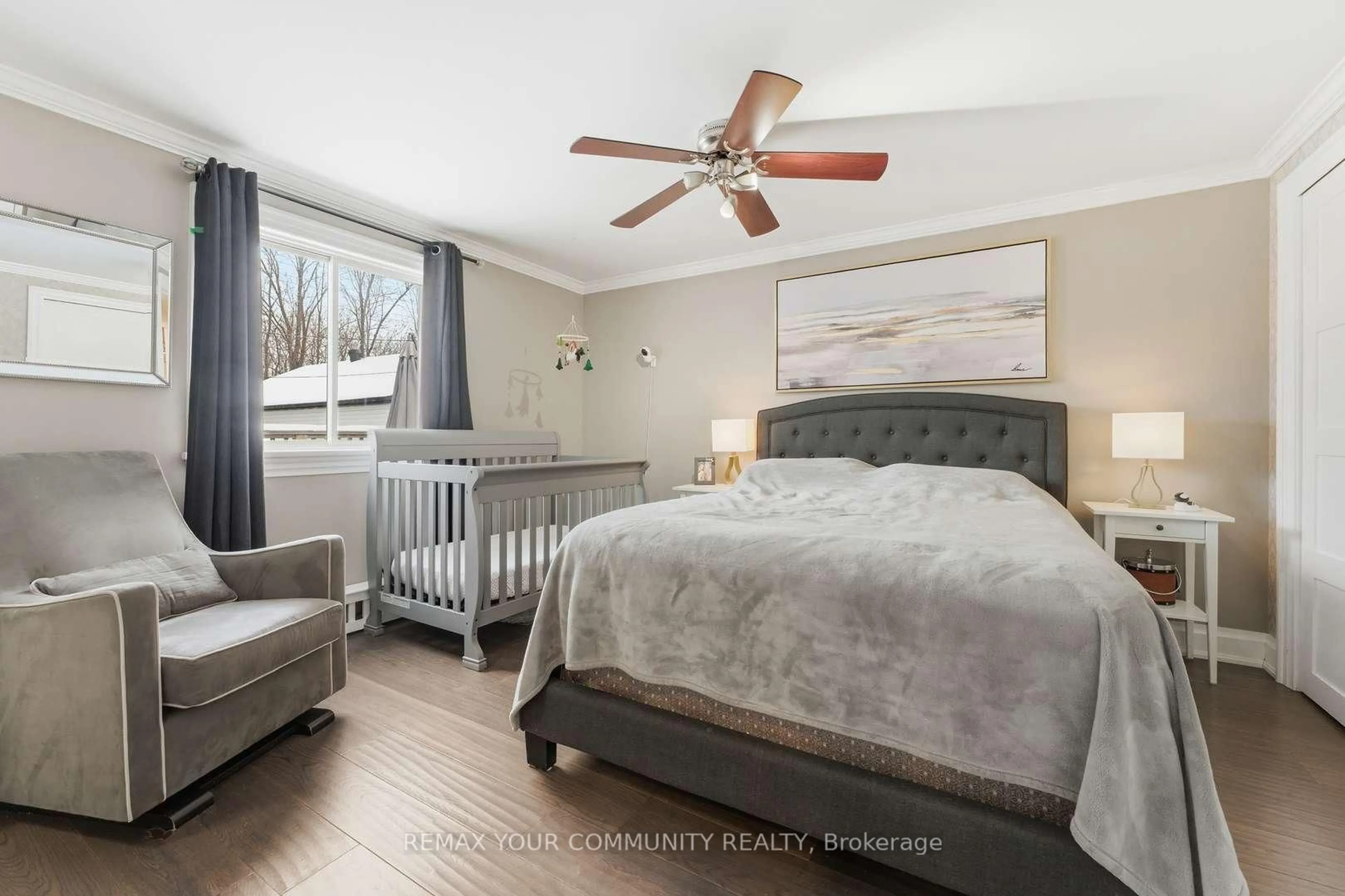 Bedroom with bed, wood/laminate floor for 41 Eastern Ave, New Tecumseth Ontario L0G 1W0