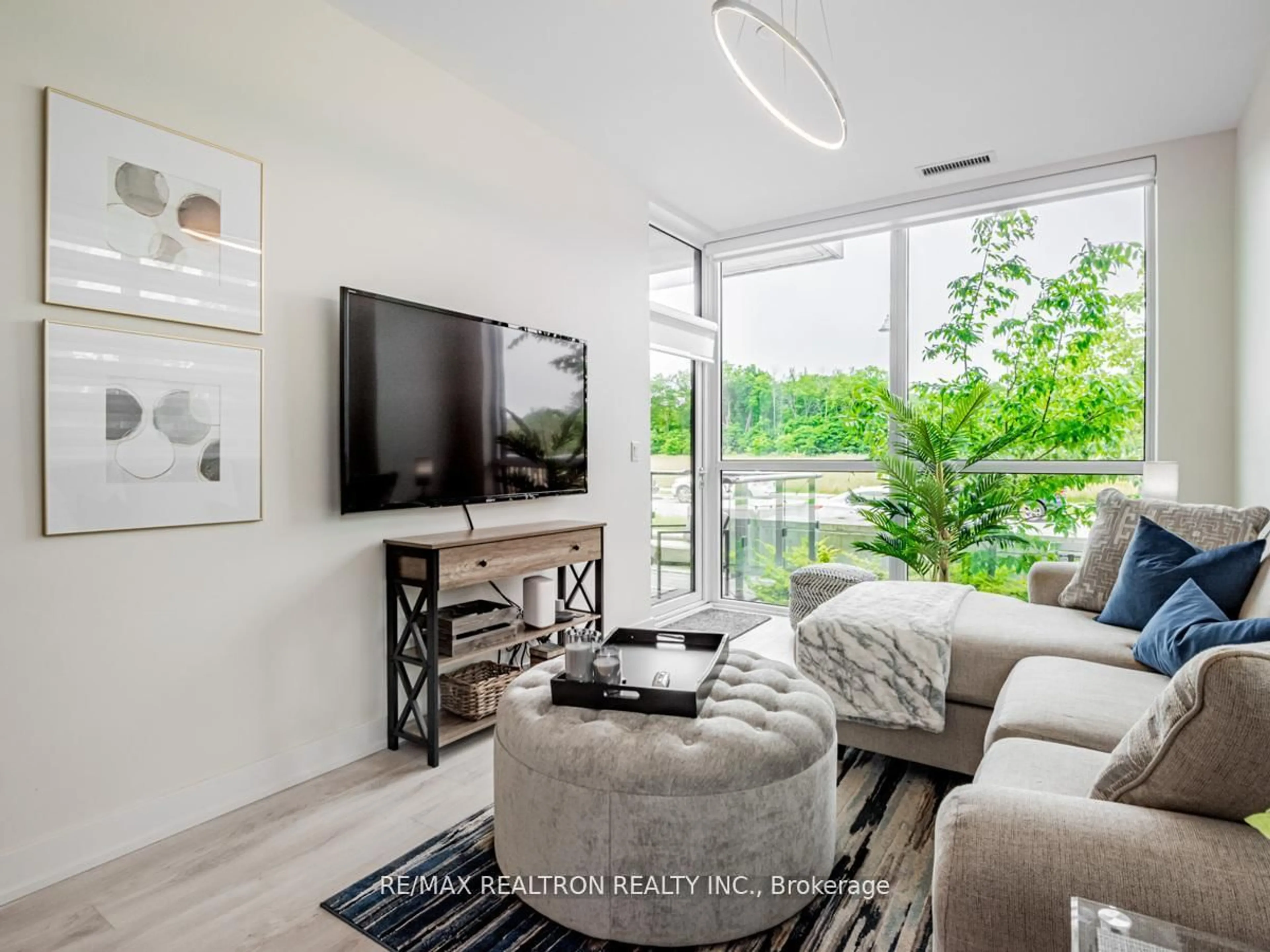 Living room with furniture, unknown for 375 Sea Ray Ave #110, Innisfil Ontario L9S 0N9