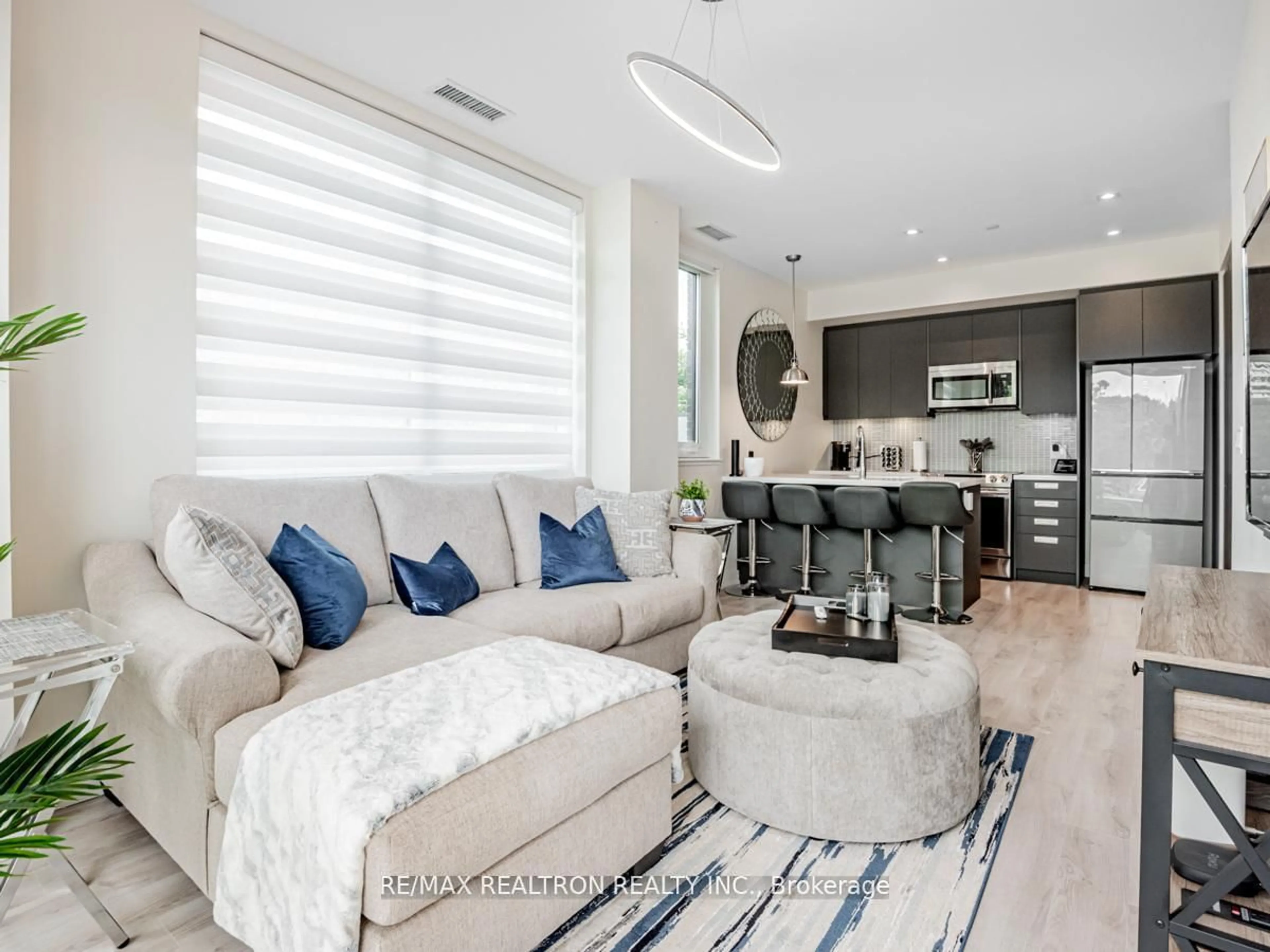 Living room with furniture, unknown for 375 Sea Ray Ave #110, Innisfil Ontario L9S 0N9