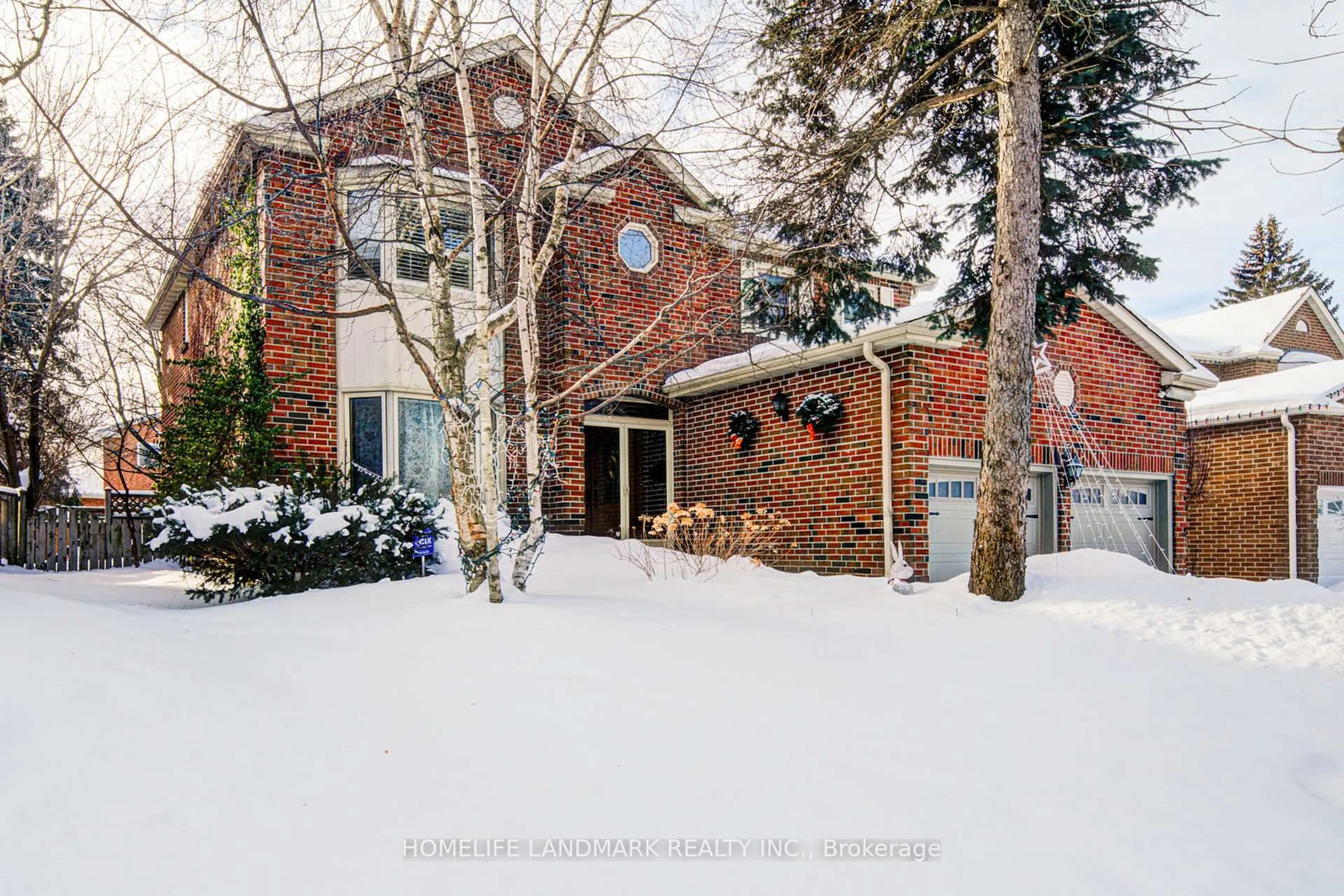 Home with brick exterior material, street for 129 Fincham Ave, Markham Ontario L3P 4A8