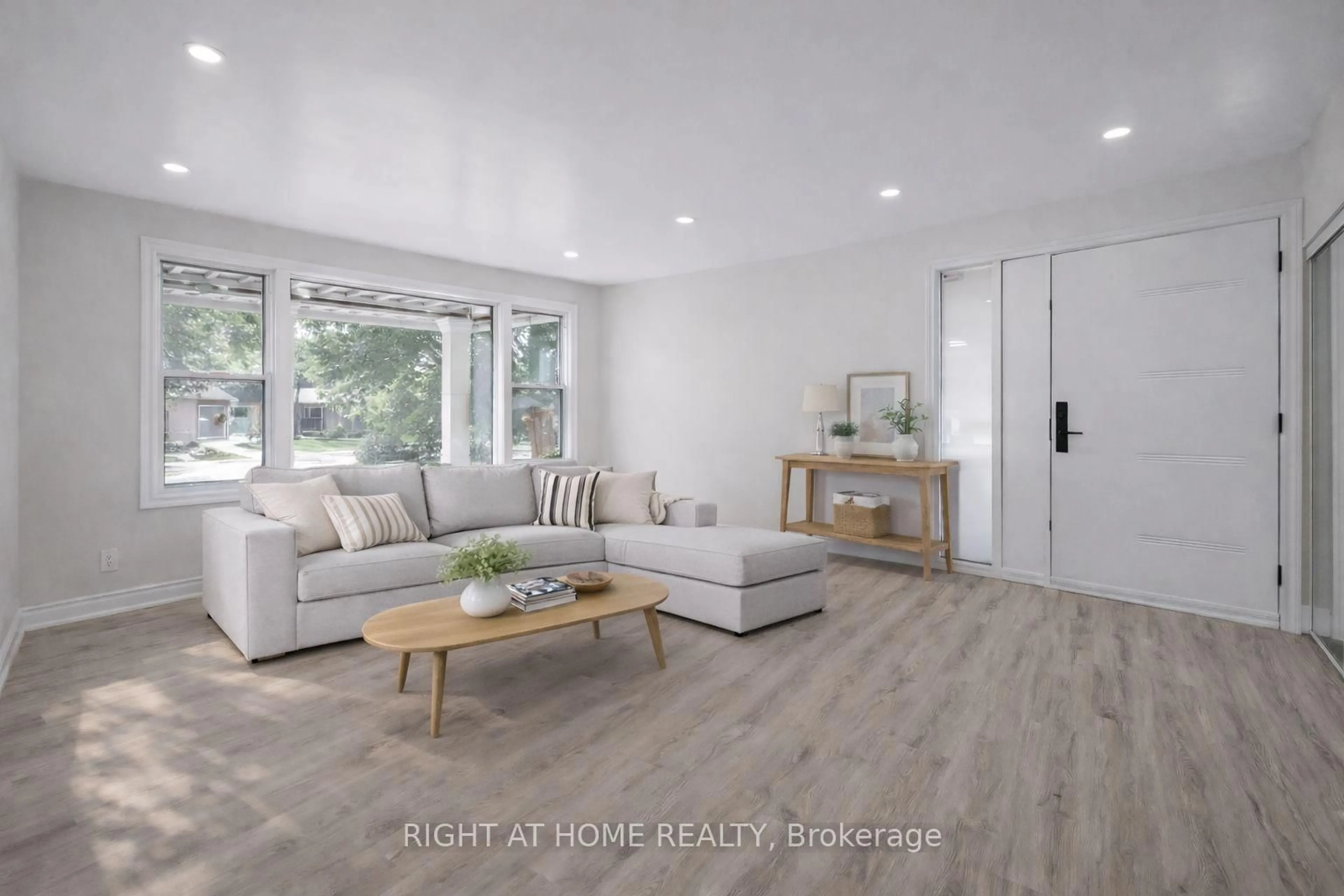 Living room with furniture, wood/laminate floor for 225 Essex Ave, Richmond Hill Ontario L4C 2C1